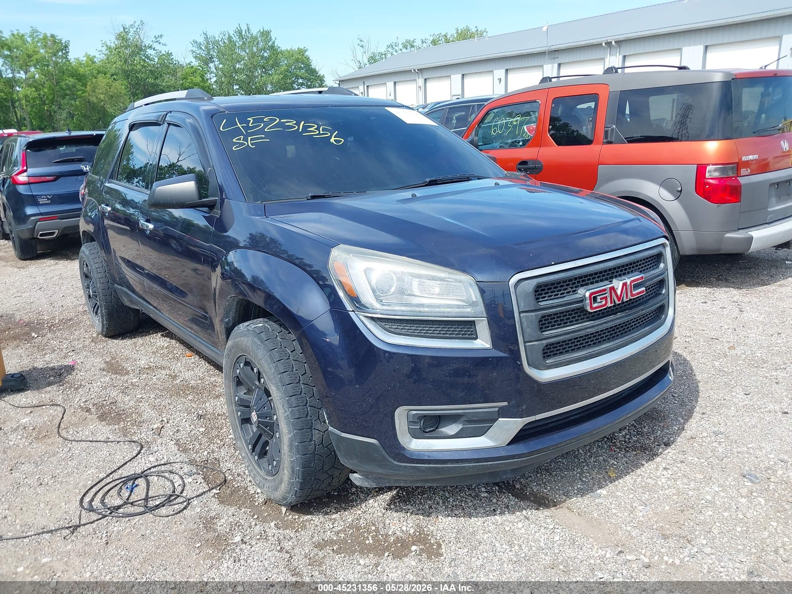 2015 GMC Acadia SLE, VIN 1GKKVNED3FJ164711 — Rear end
