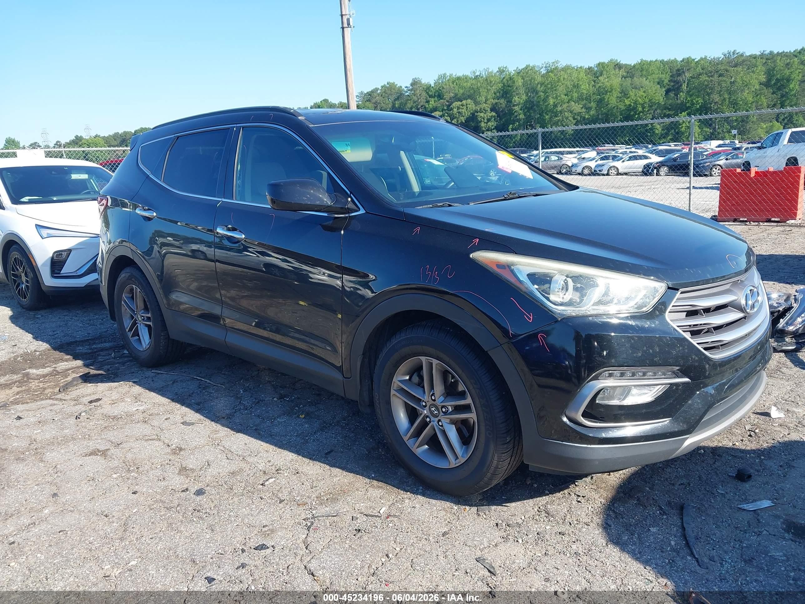 2017 Hyundai Santa Fe 2.4L, VIN 5NMZU3LB0HH010825 — Зад