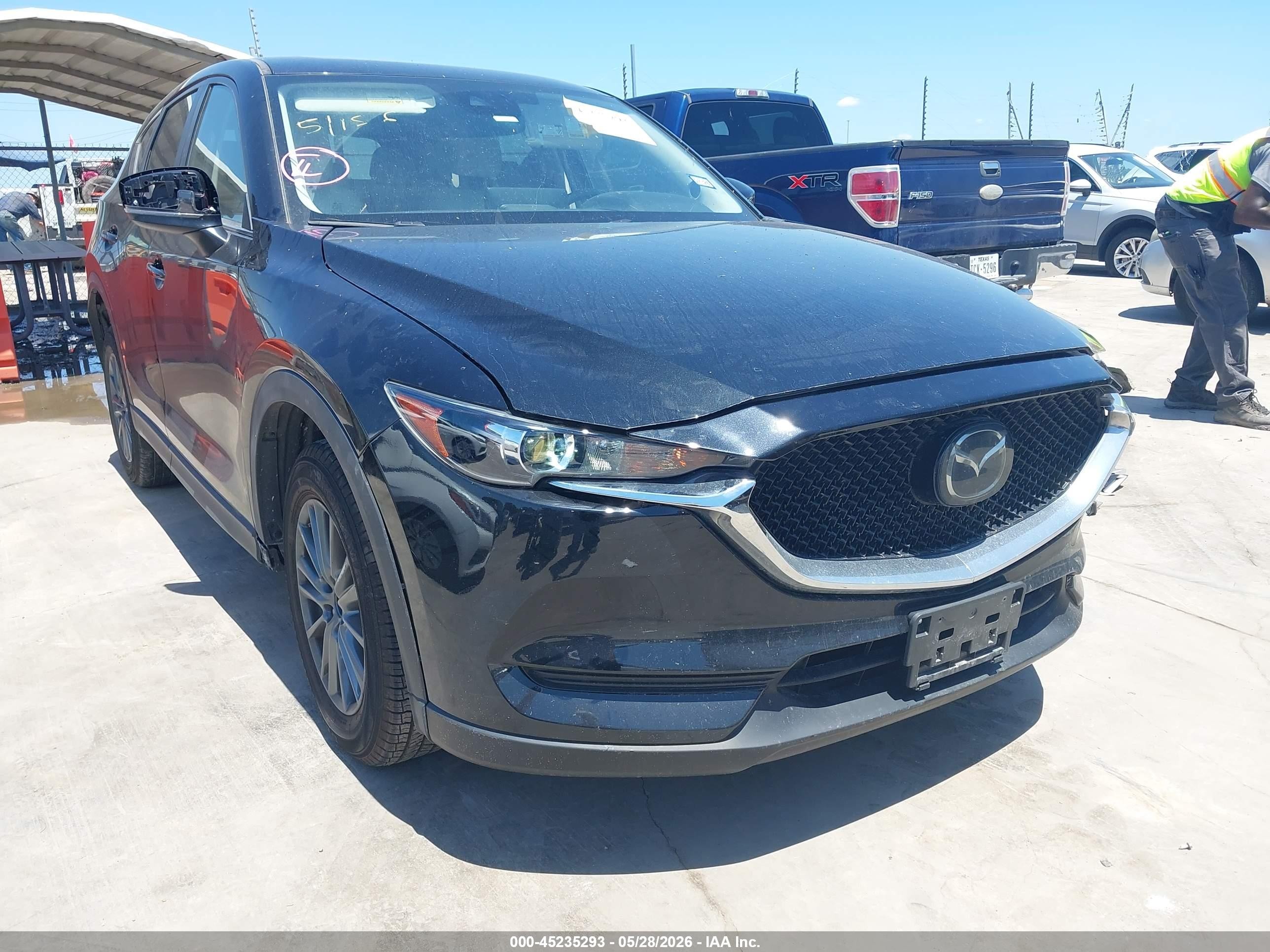 2021 Mazda CX-5 Touring, VIN JM3KFACMXM0418820 — Front end