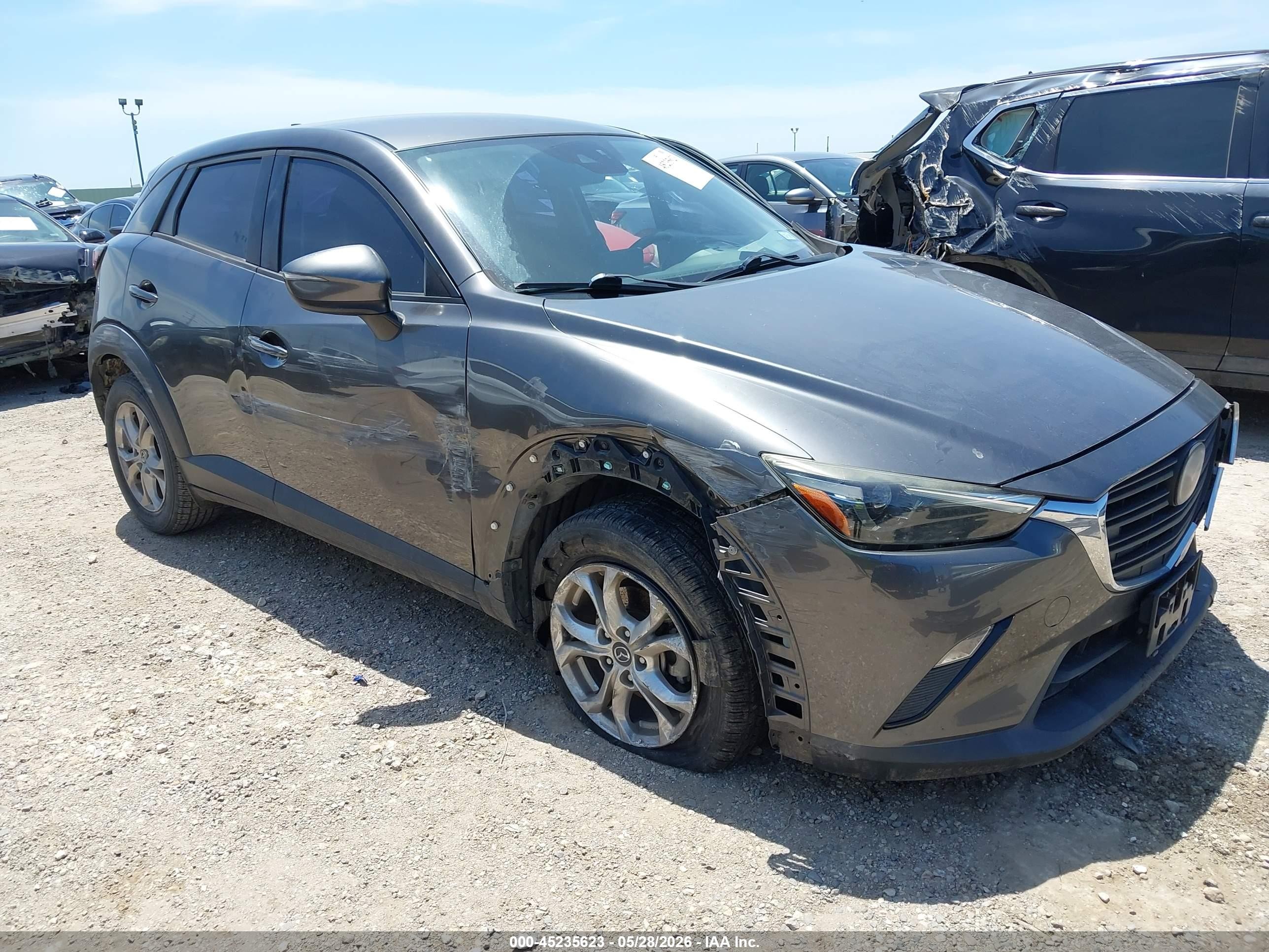 2019 Mazda CX-3 Sport, VIN JM1DKDB73K1400287 — Side