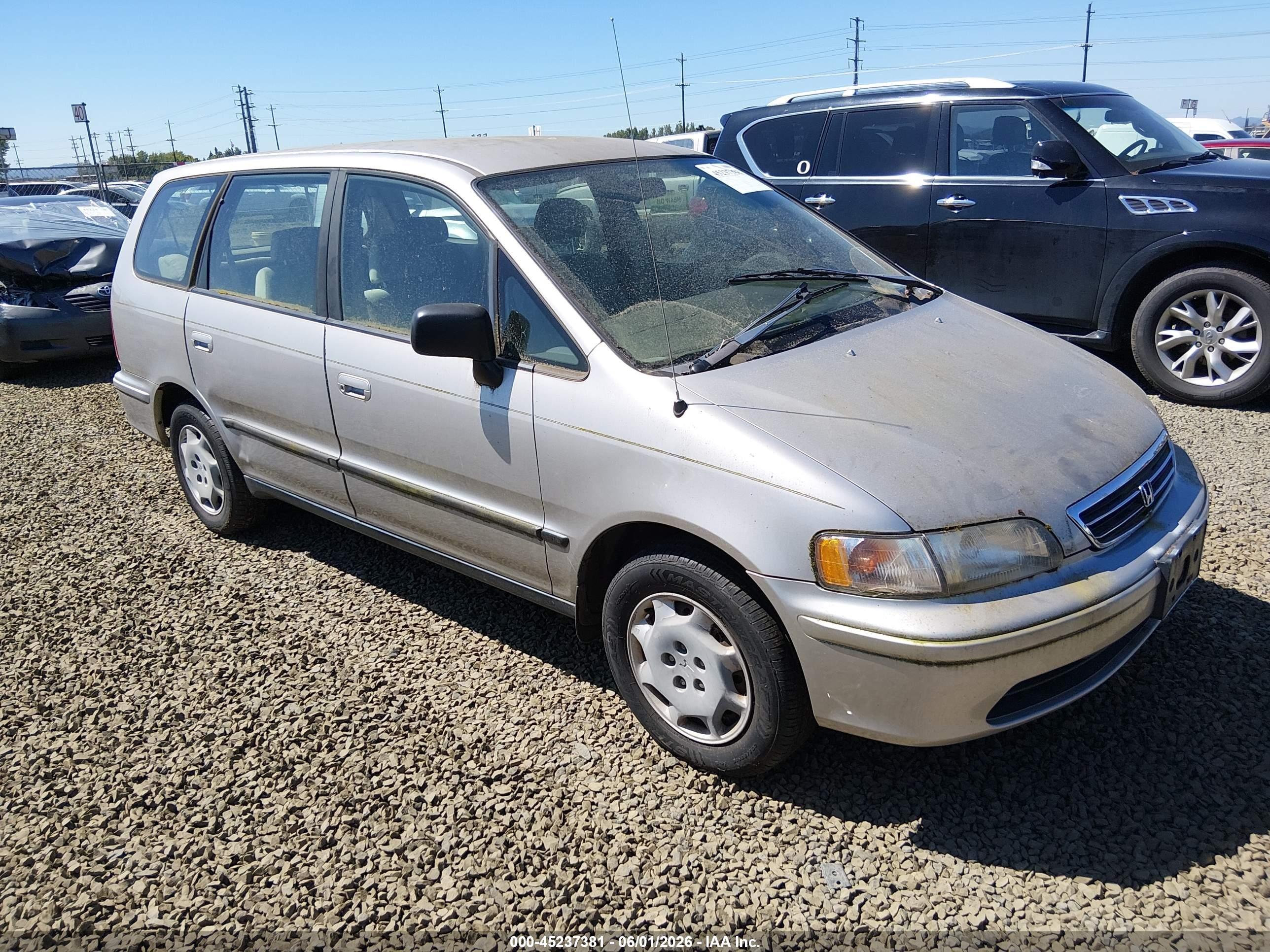 1998 Honda Odyssey LX, VIN JHMRA3865WC013783 — Normal wear