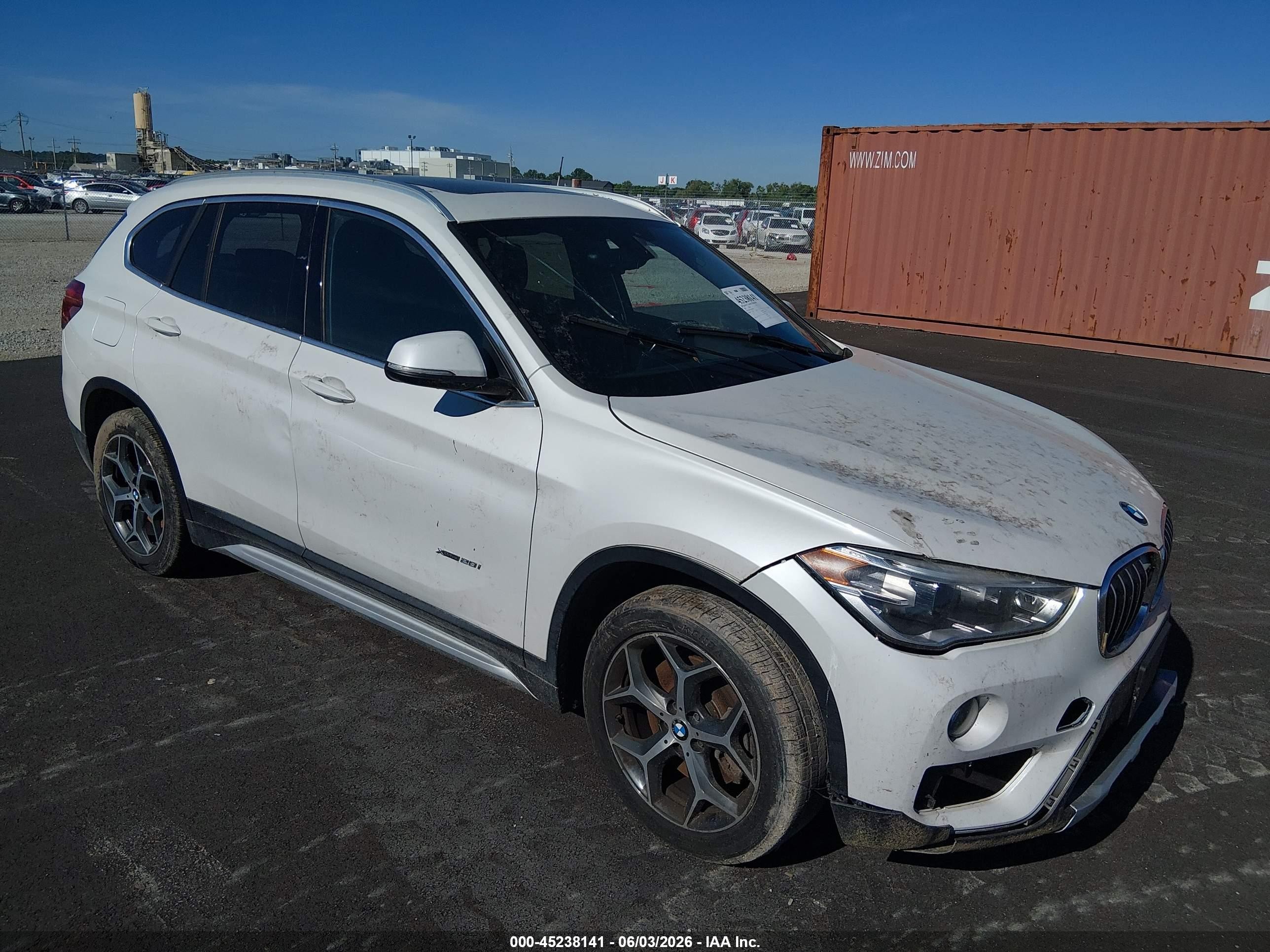 2018 BMW X1 xDrive28i, VIN WBXHT3C38J5F90086 — Front end
