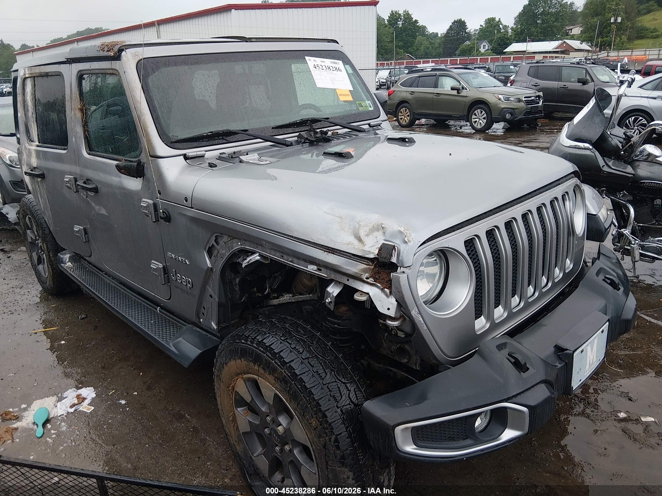2018 Jeep Wrangler Unlimited Sahara, VIN 1C4HJXEG1JW199461 — Rollover