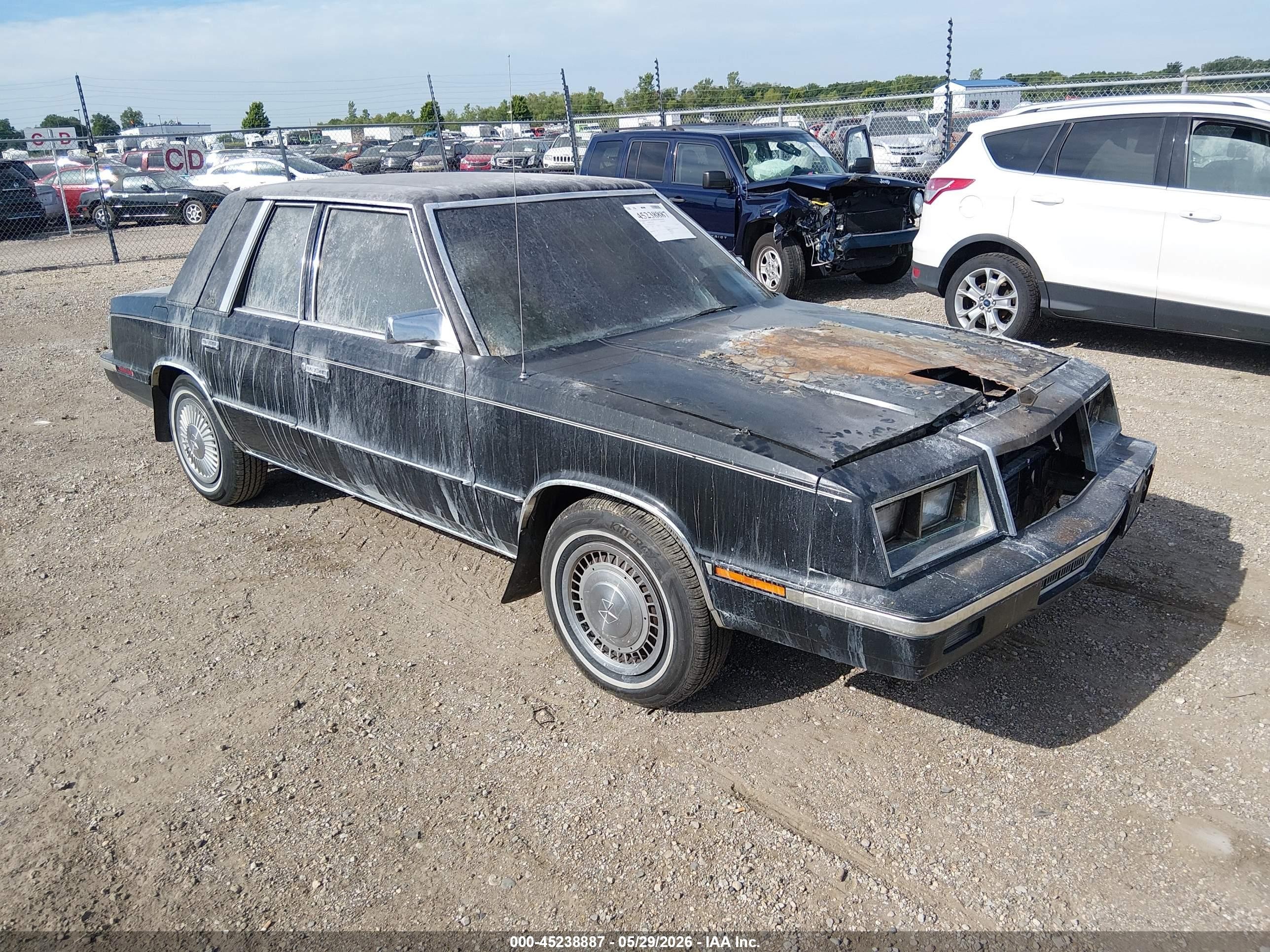 1985 Chrysler LeBaron, VIN 1C3BC56D3FF201537 — Engine fire