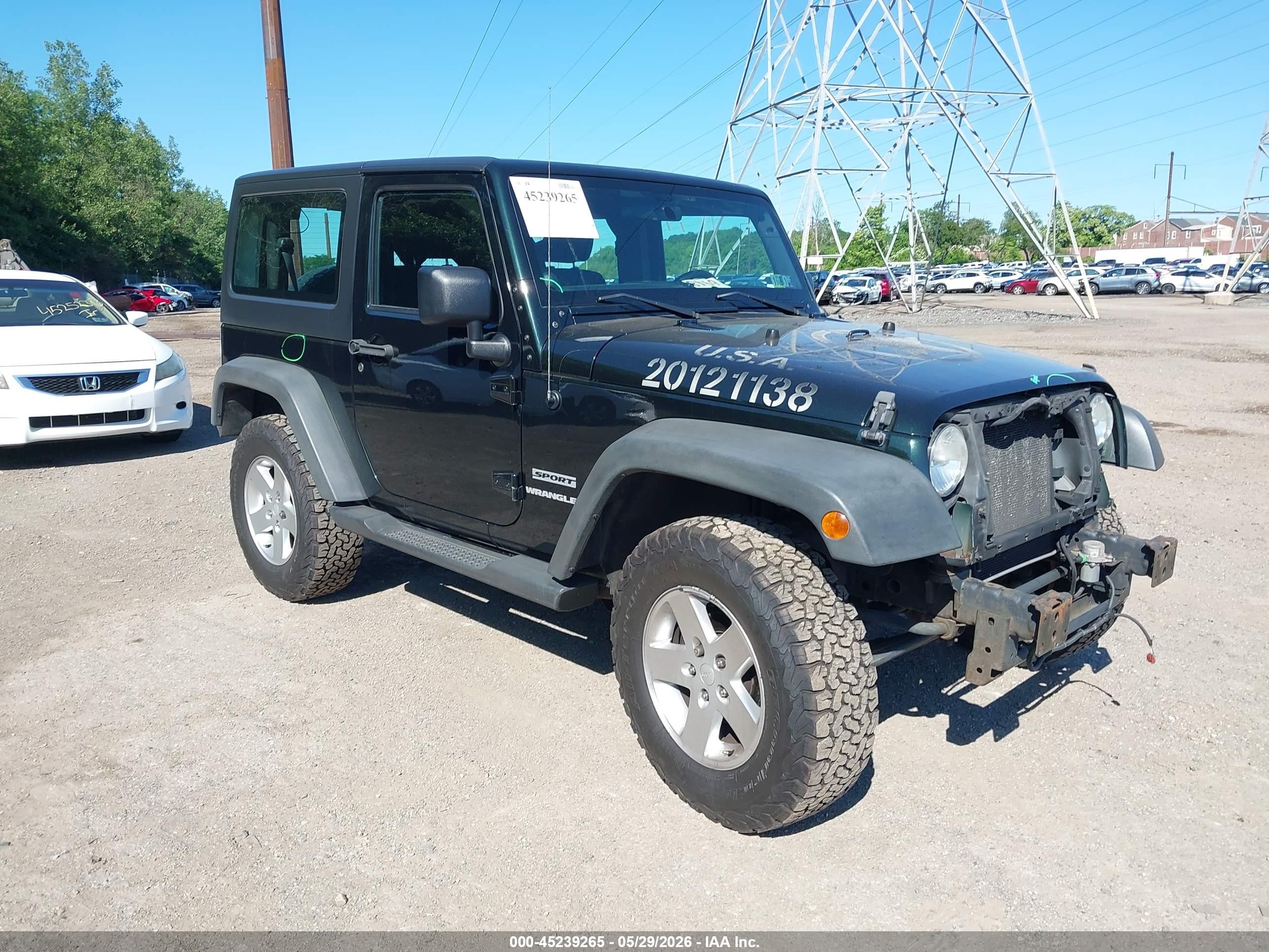 2012 Jeep Wrangler Sport, VIN 1C4AJWAG2CL168774 — Front end