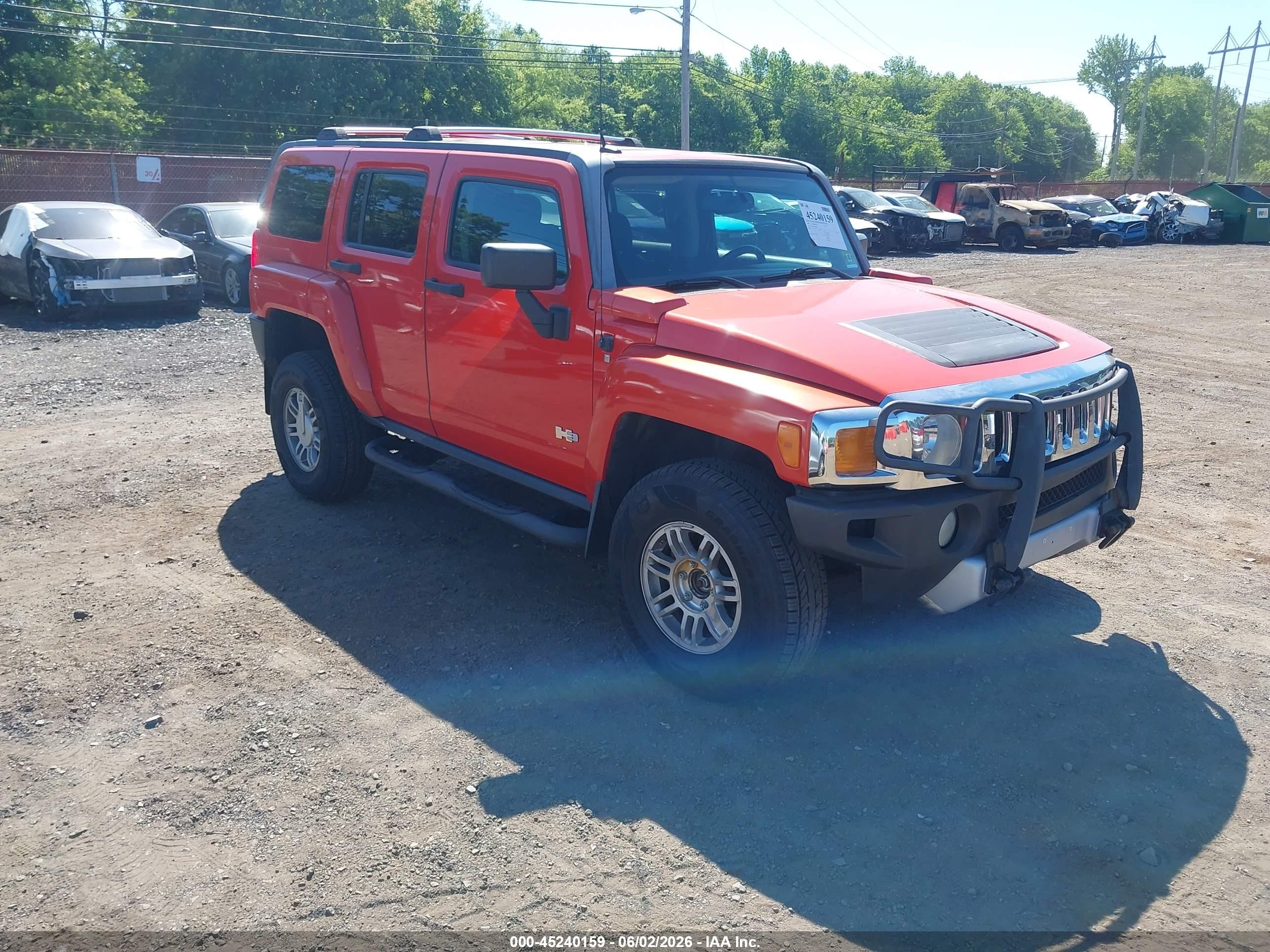 2009 Hummer H3 Adventure, VIN 5GTEN13E898102092 — Side