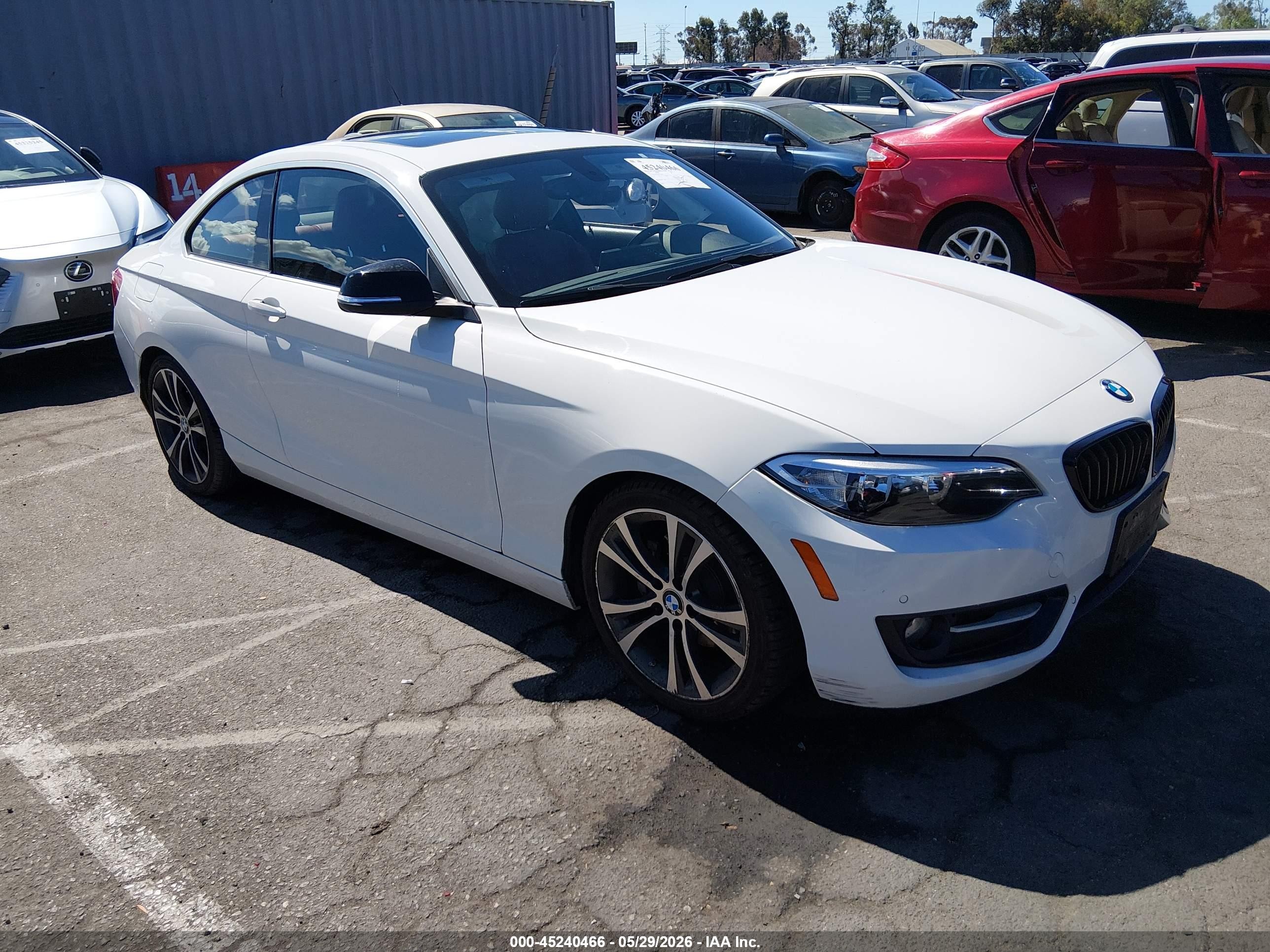 2014 BMW 2 Series 228i, VIN WBA1F5C55EV255340 — Side