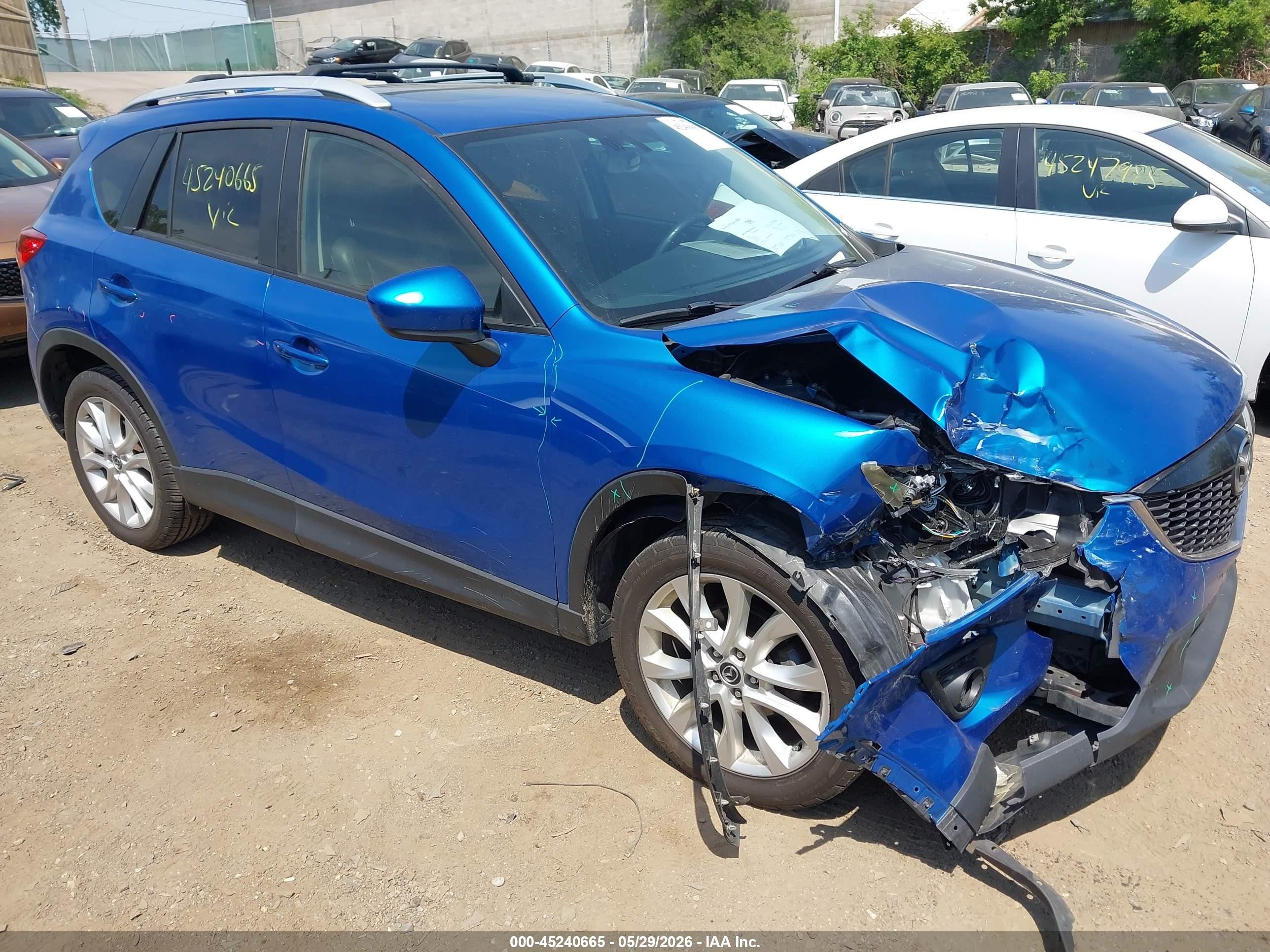 2013 Mazda CX-5 Grand Touring, VIN JM3KE4DE2D0165763 — Front end