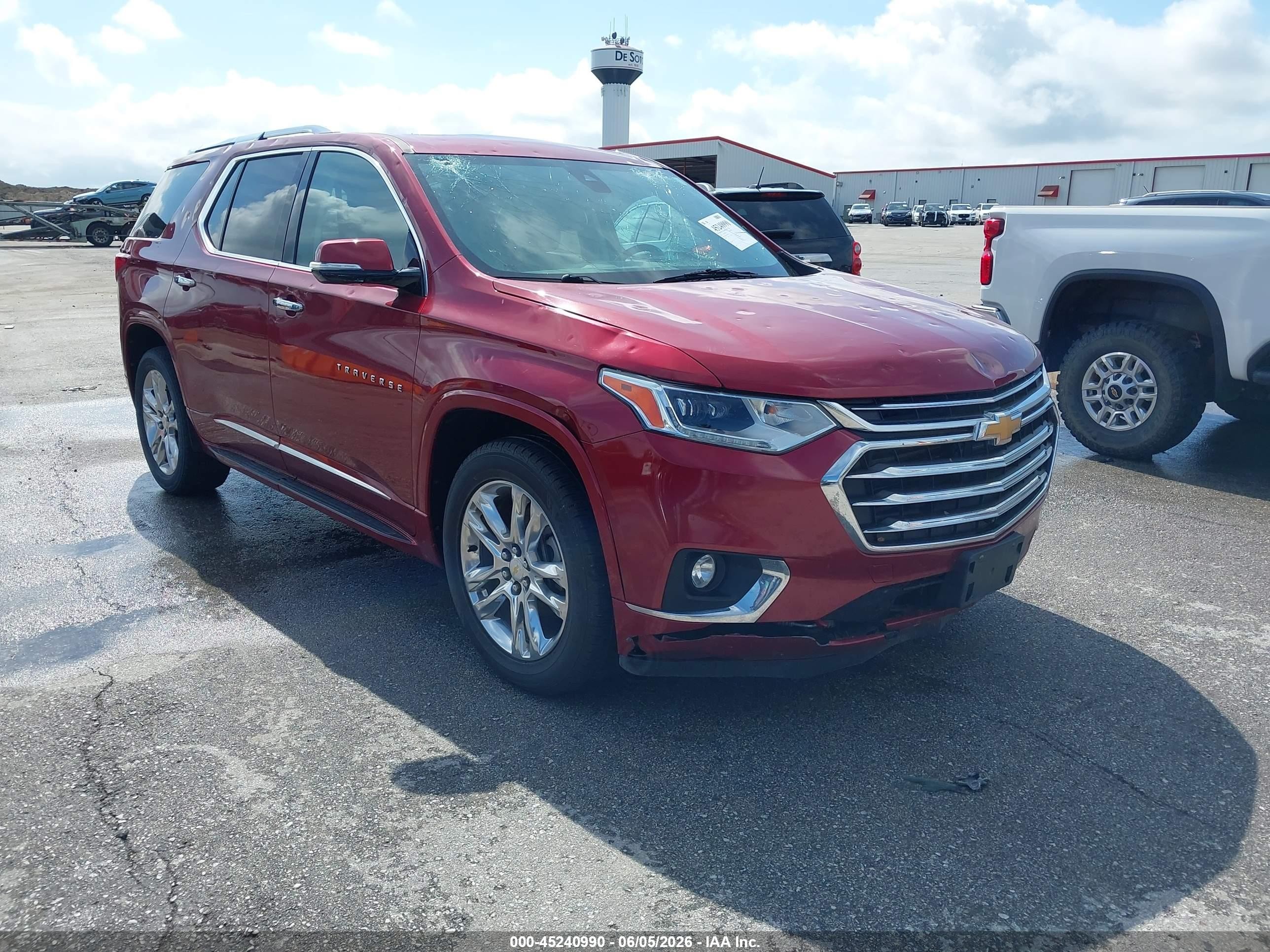 2018 Chevrolet Traverse High Country, VIN 1GNEVKKW9JJ110567 — Hail