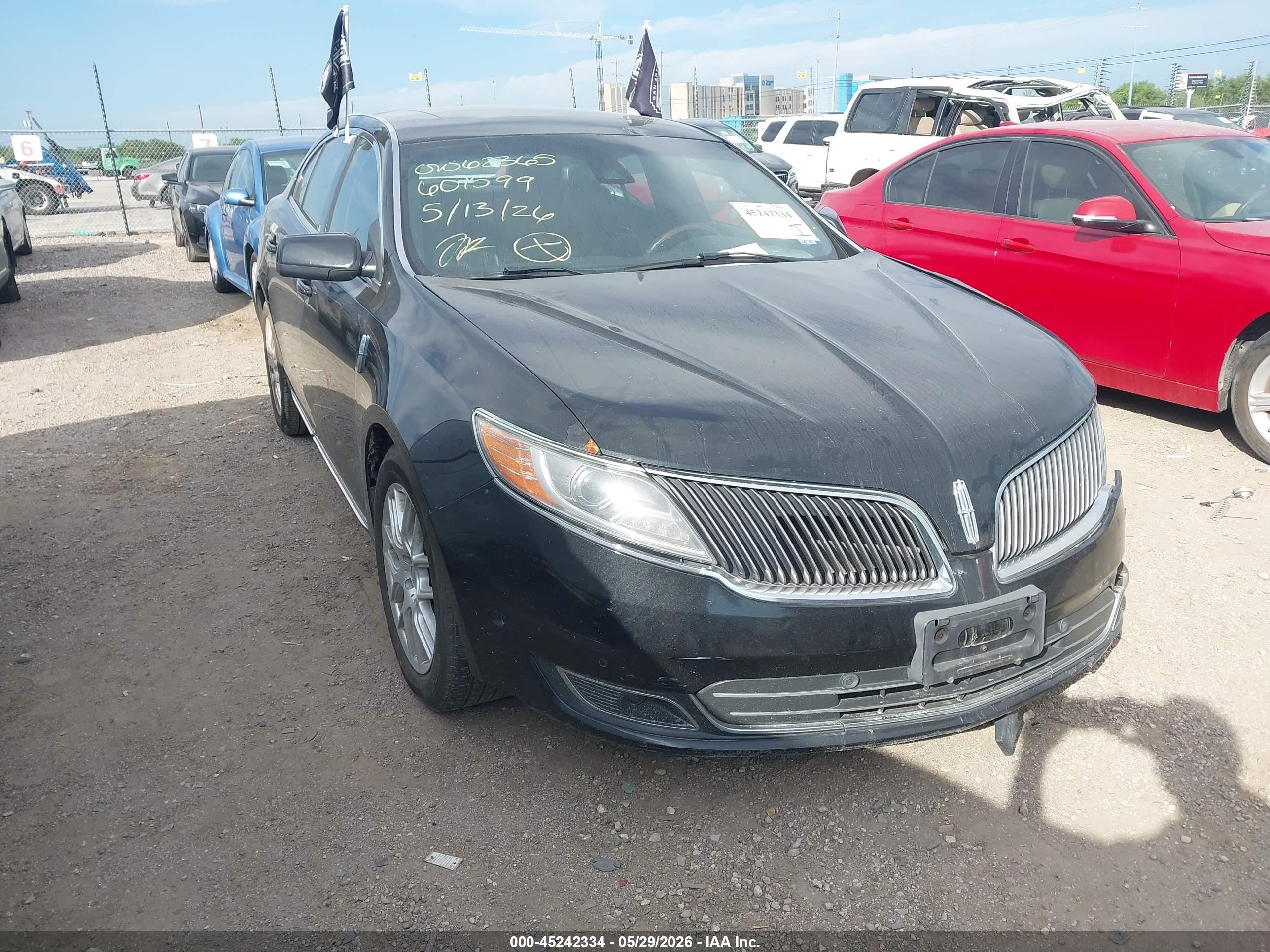 2013 Lincoln MKS, VIN 1LNHL9DK7DG601599 — Side