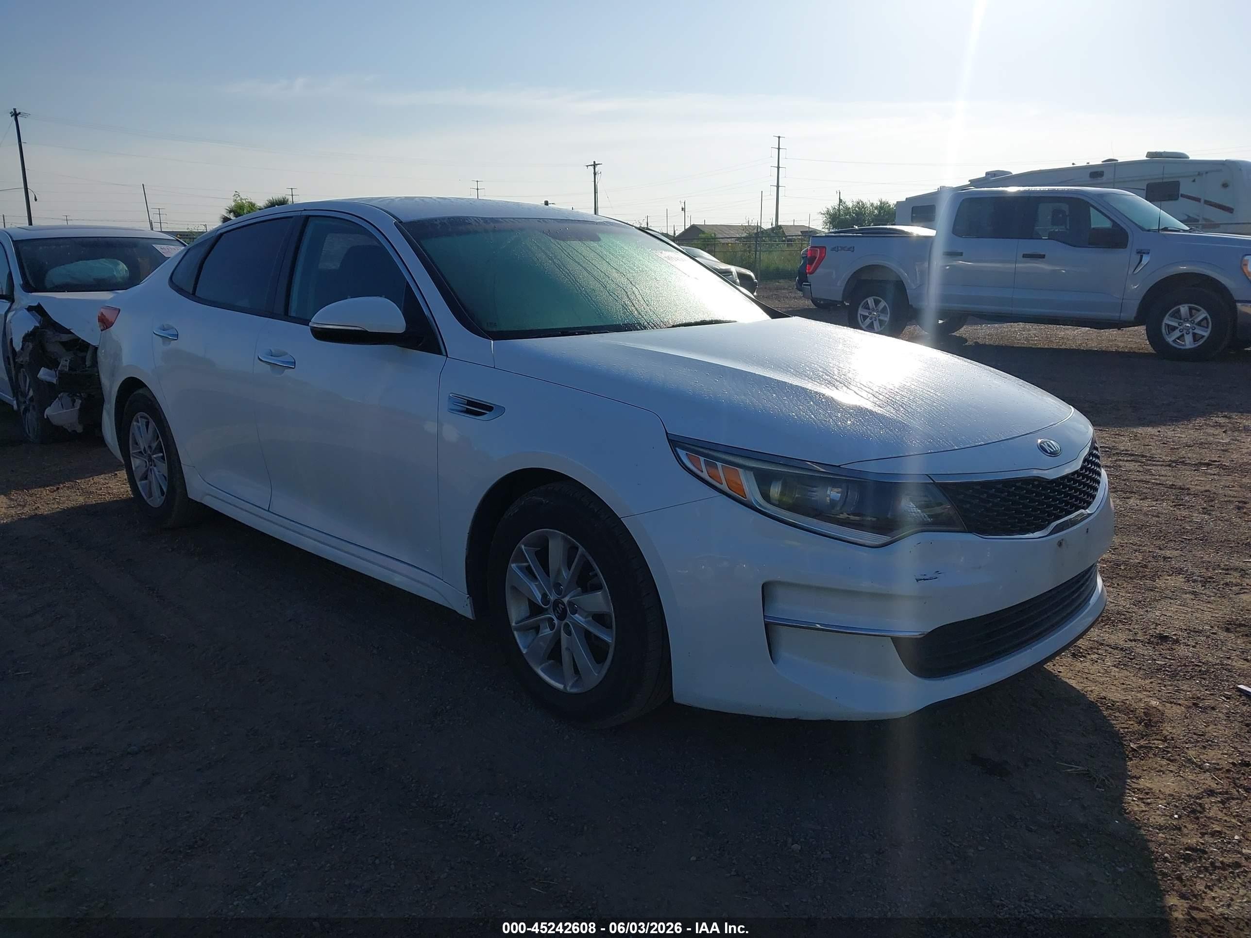 2018 Kia Optima LX, VIN 5XXGT4L34JG244897 — Repossession