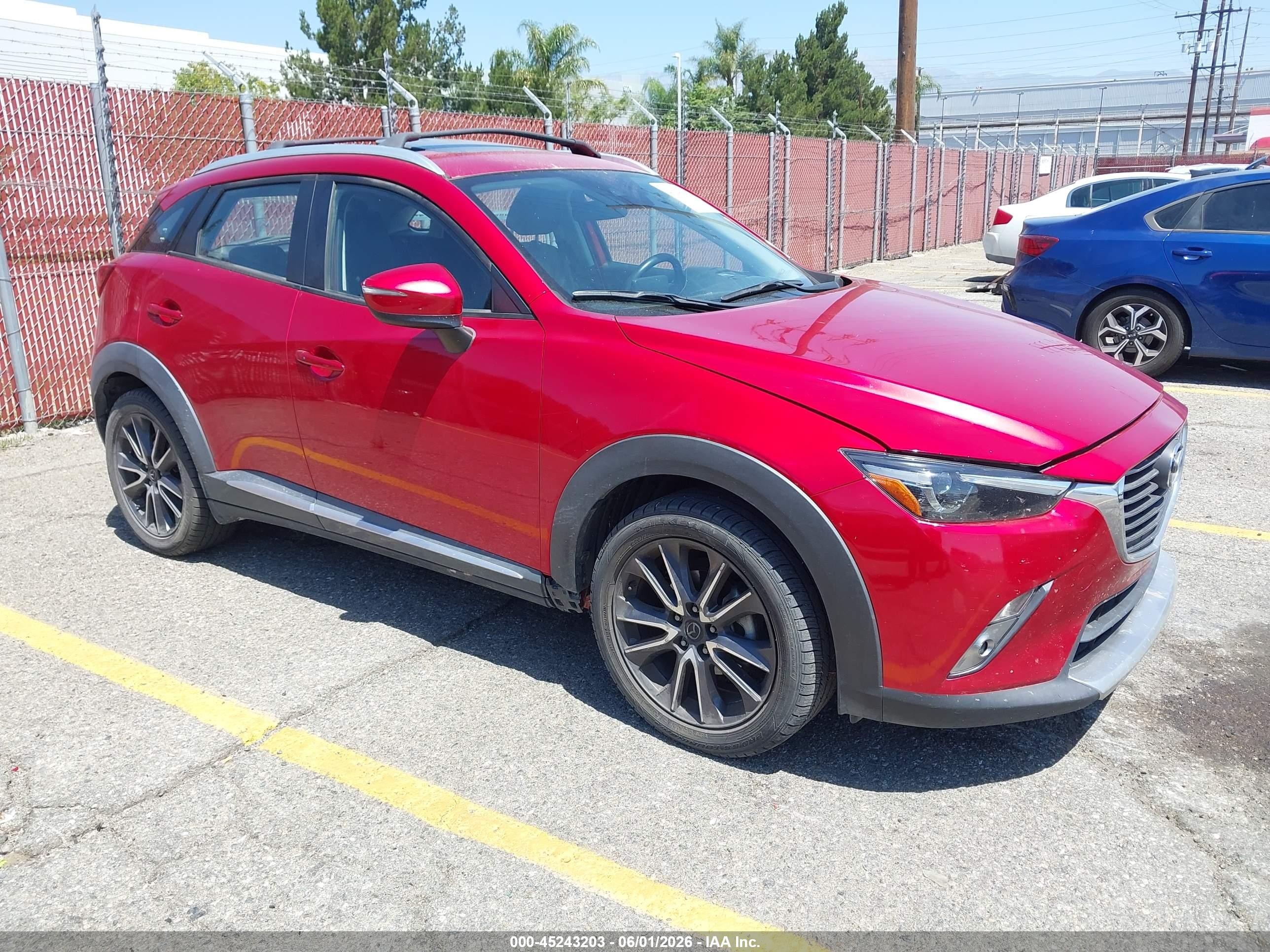 2018 Mazda CX-3 Grand Touring, VIN JM1DKDD72J0305804 — Rear end