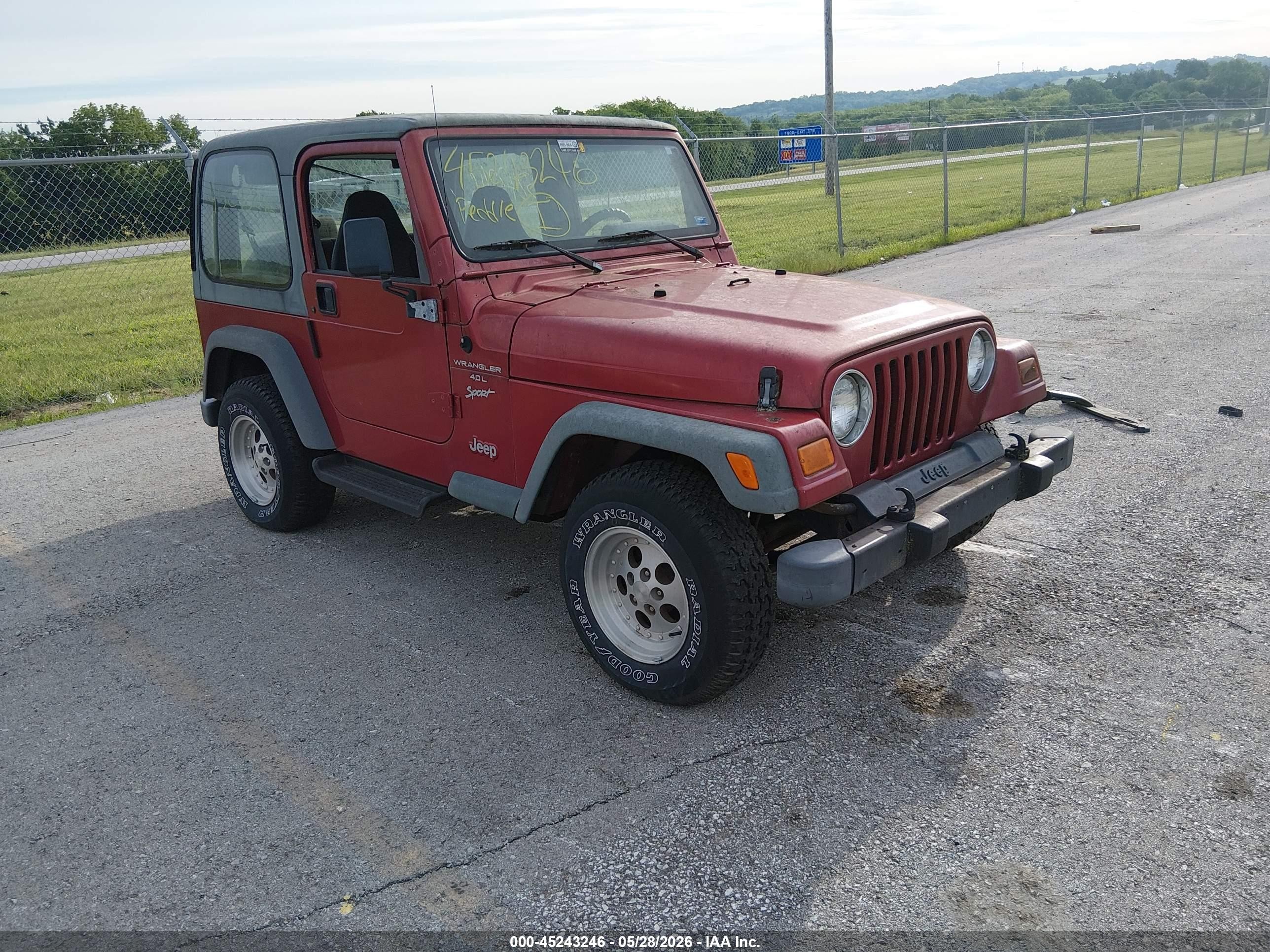 1999 Jeep Wrangler Sport, VIN 1J4FY19S7XP445022 — Normal wear