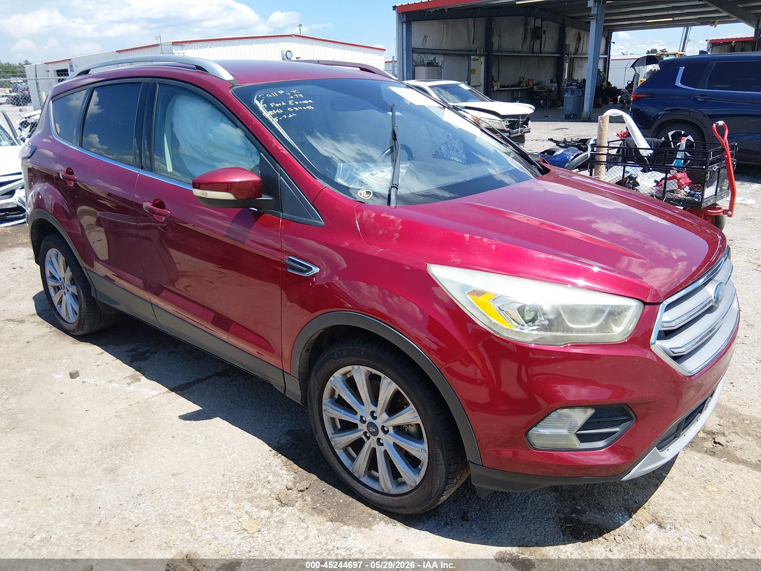 2017 Ford Escape Titanium, VIN 1FMCU0J91HUC84446 — Side