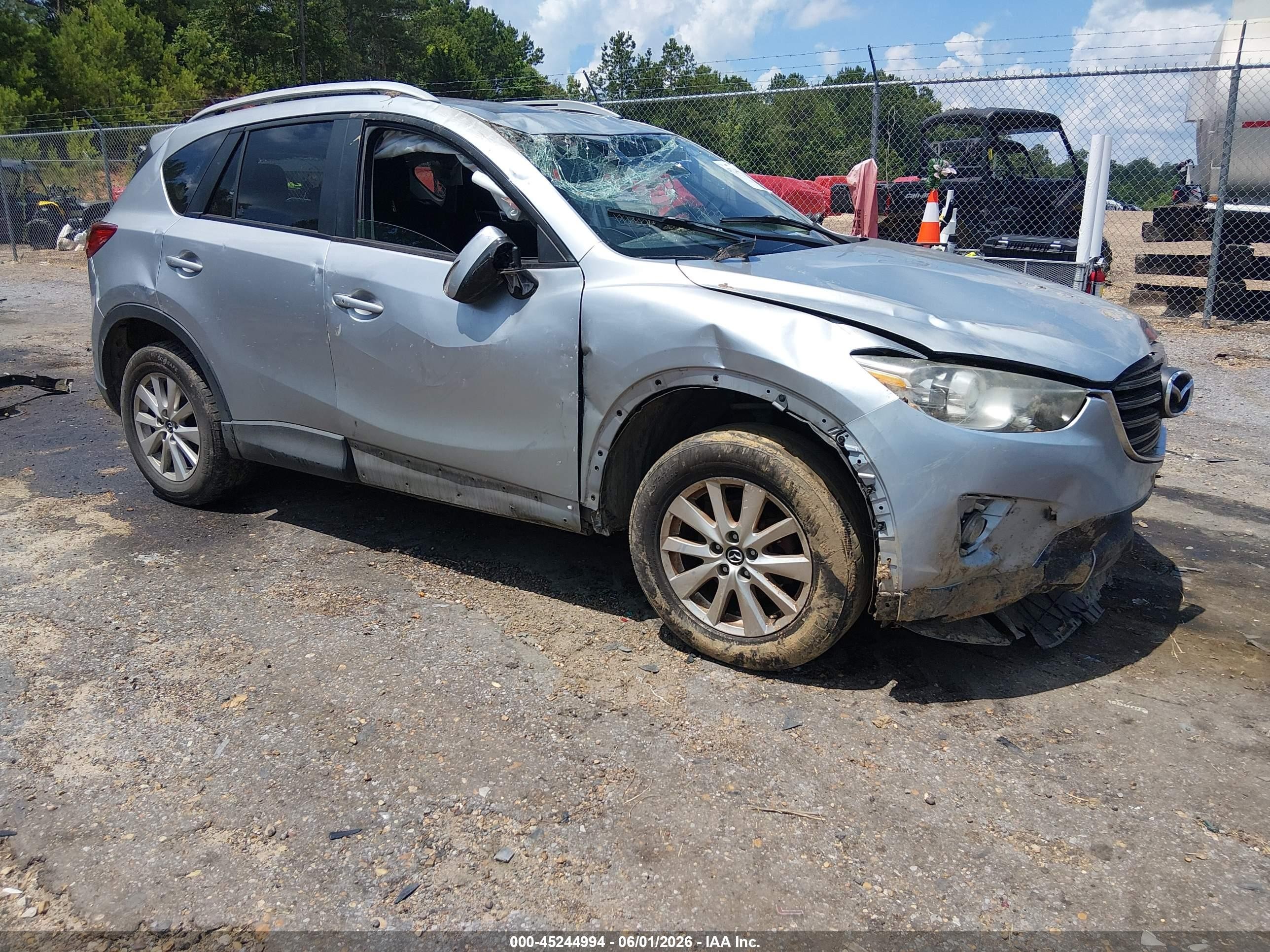 2016 Mazda CX-5 Touring, VIN JM3KE2CY6G0692631 — Rollover