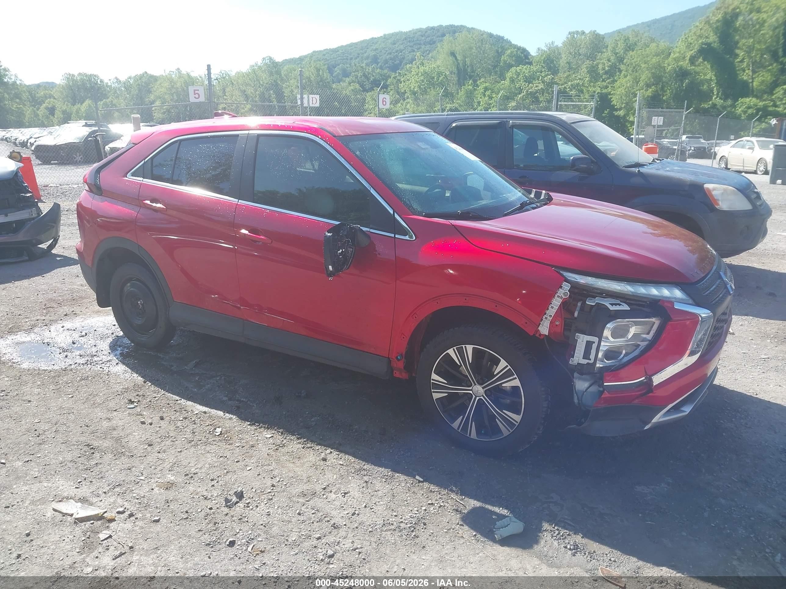 2022 Mitsubishi Eclipse Cross SE, VIN JA4ATWAA5NZ059564 — Бок