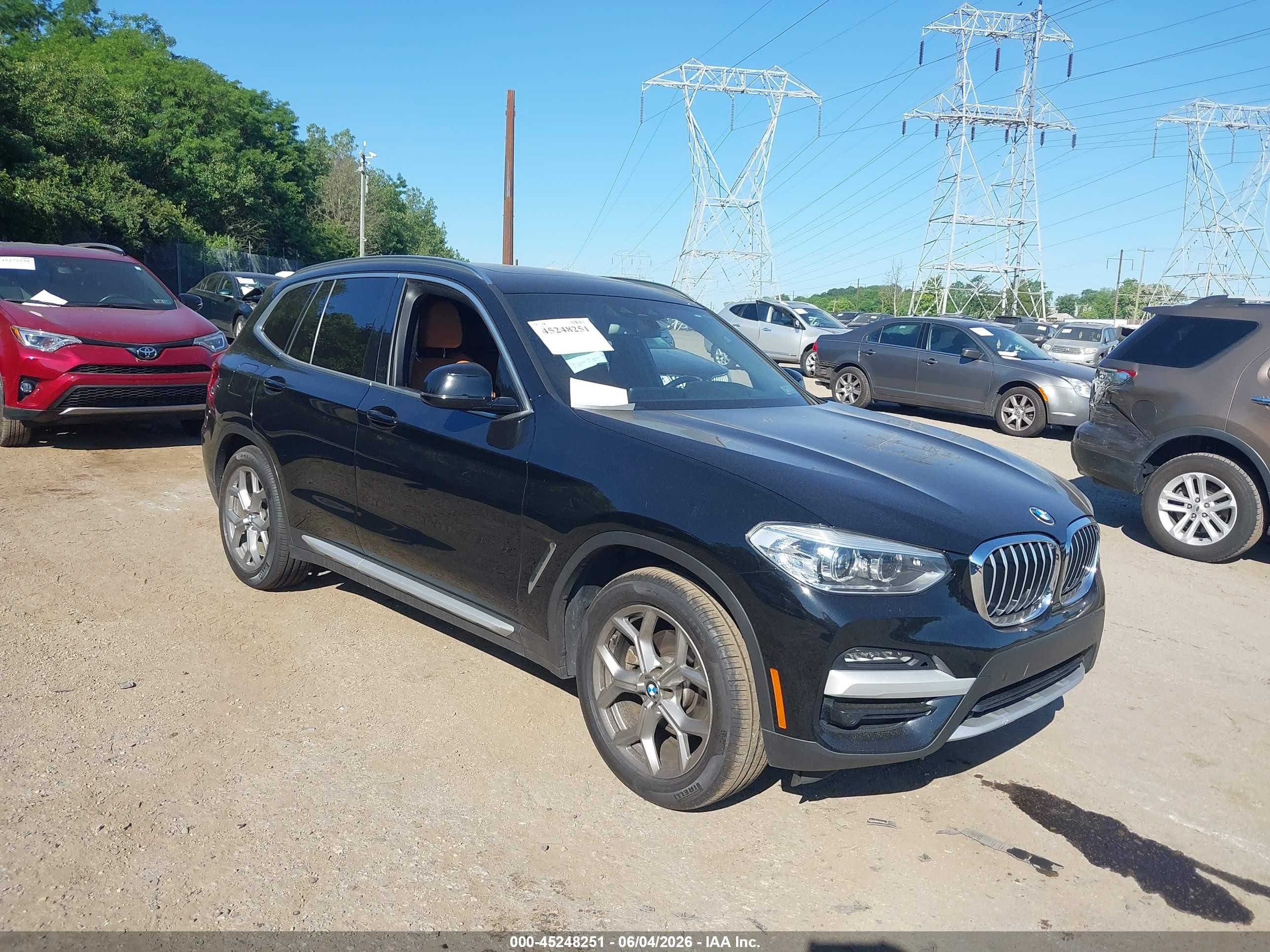 2021 BMW X3 xDrive30i, VIN 5UXTY5C05M9G38732 — Rear end