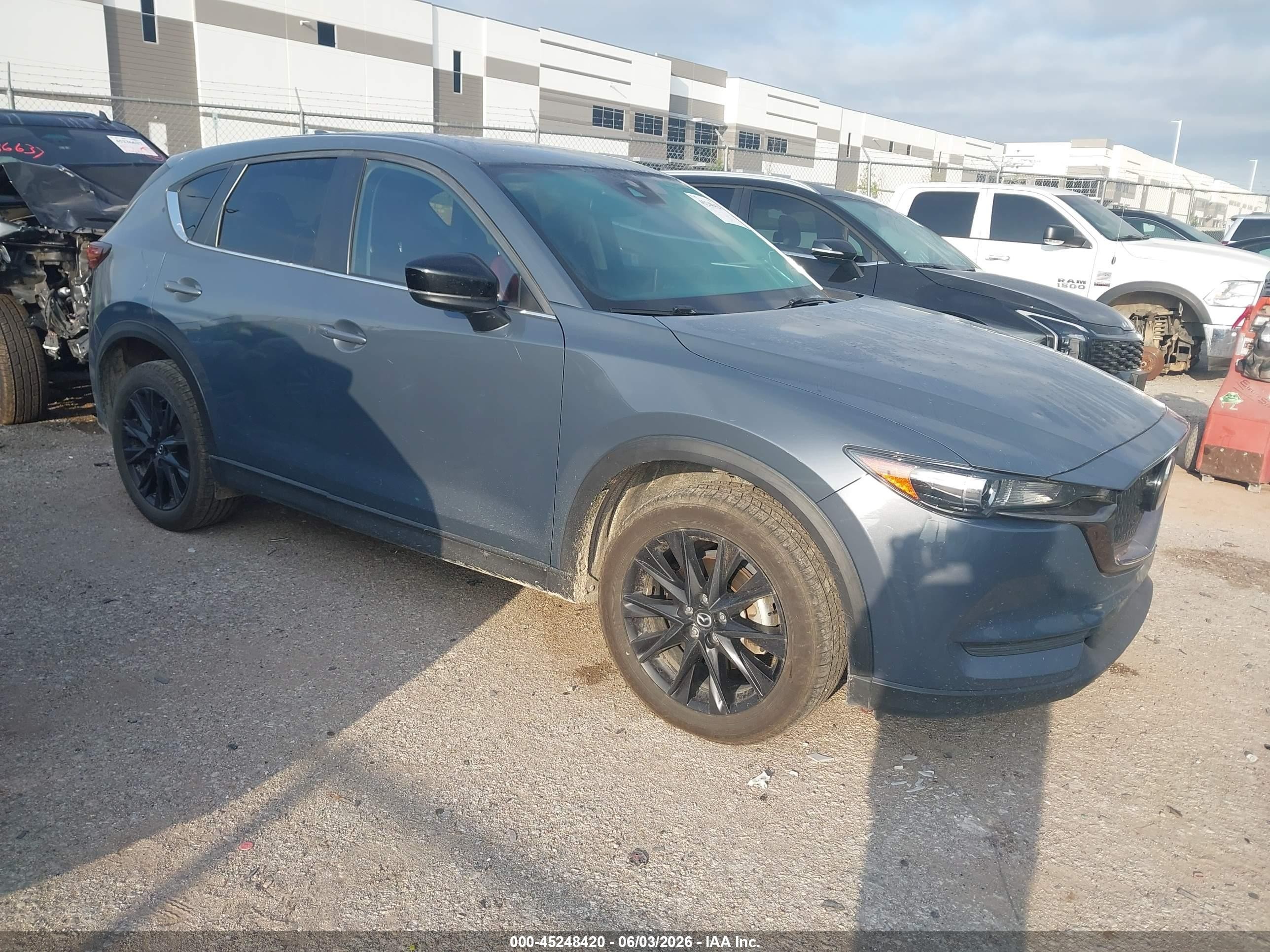 2021 Mazda CX-5 Carbon Edition, VIN JM3KFBCY3M0476017 — Град