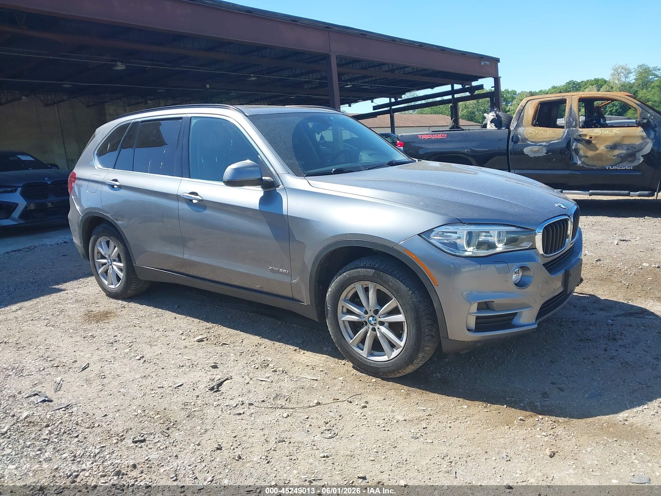 2014 BMW X5 xDrive35i, VIN 5UXKR0C54E0H24546 — Зад