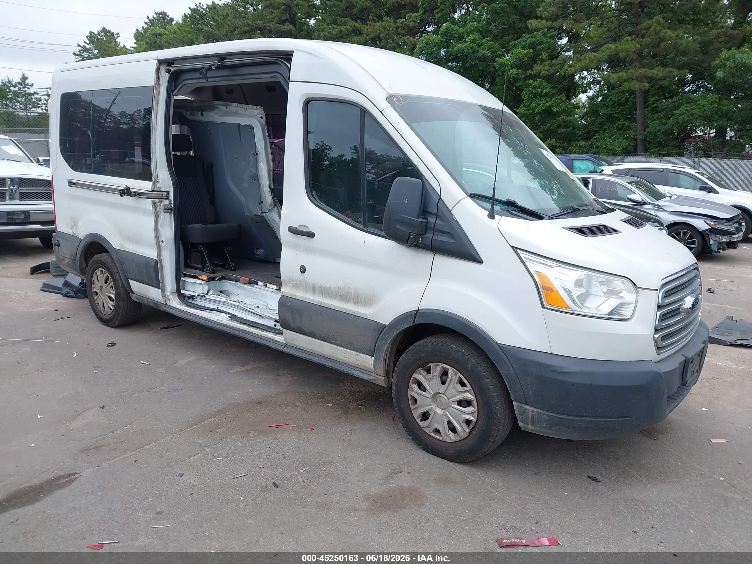 2017 Ford Transit Passenger XLT, VIN 1FBZX2CM0HKA90350 — Side
