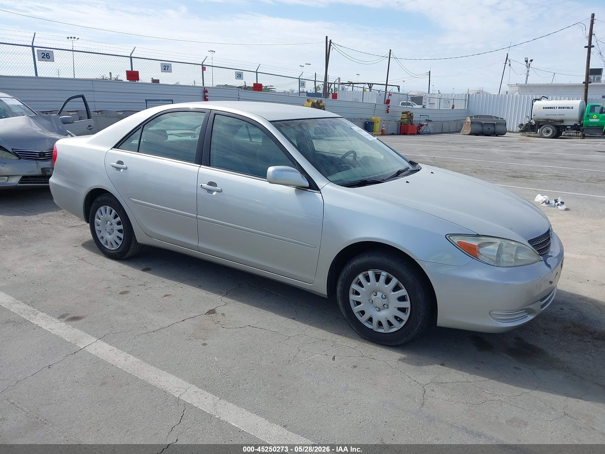 2002 Toyota Camry LE, VIN 4T1BE32K92U587588 — Side
