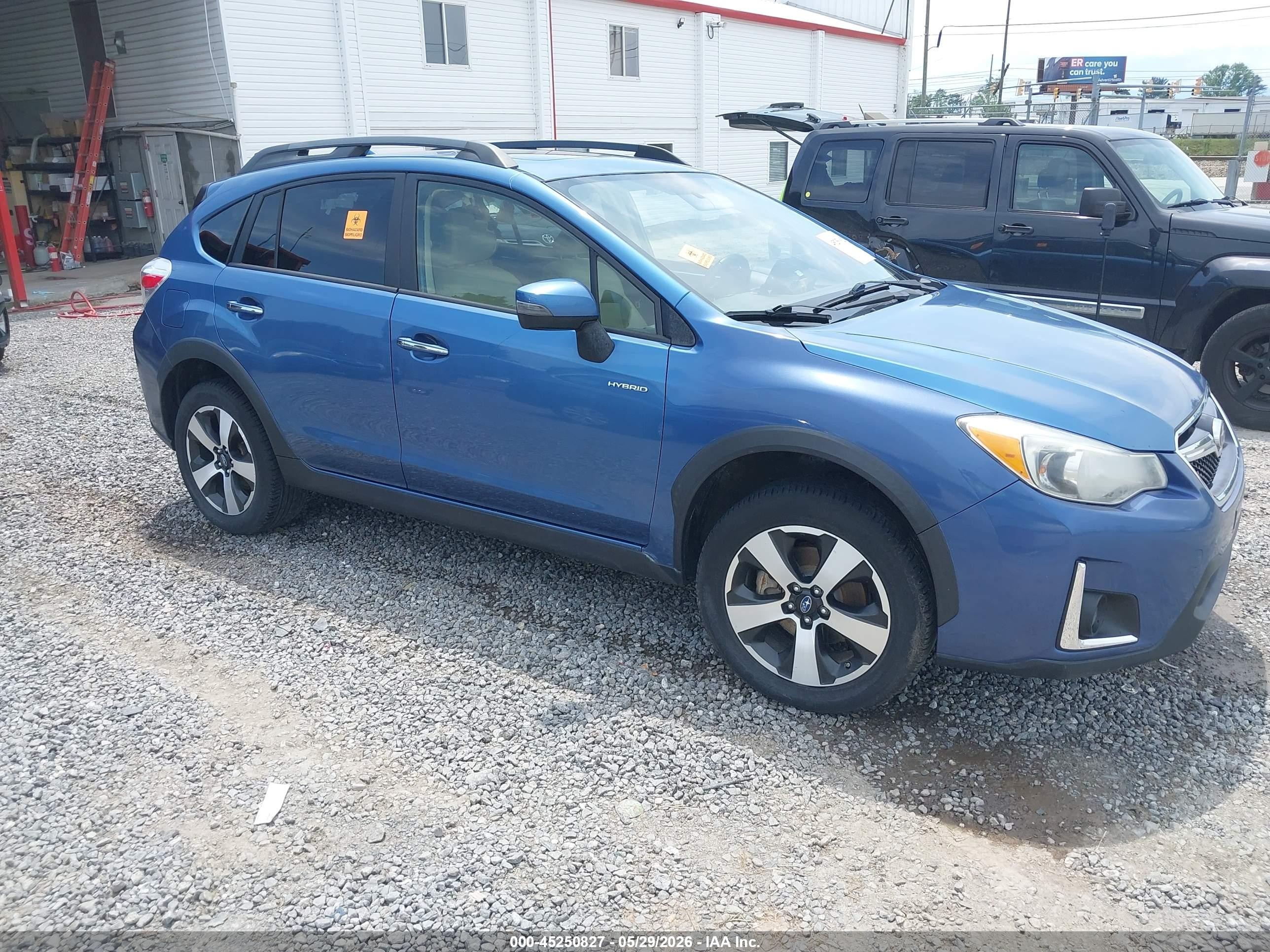 2016 Subaru Crosstrek Touring, VIN JF2GPBLC9GH248319 — Vandalism