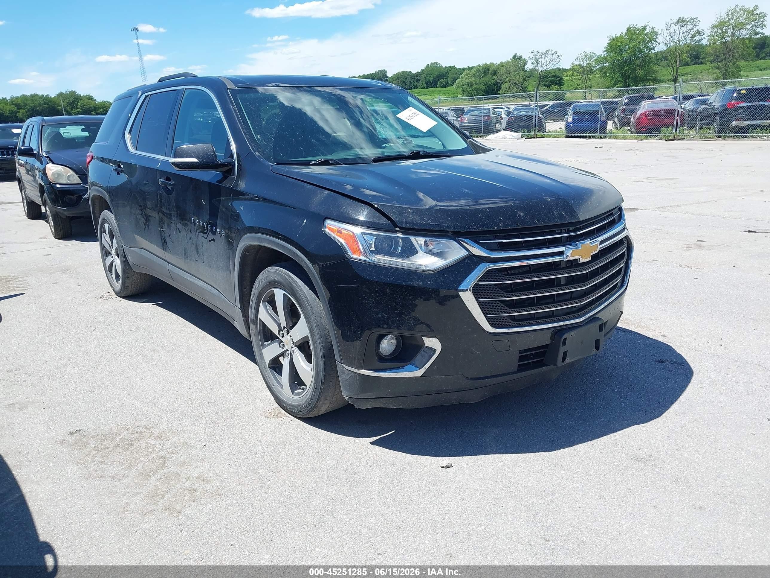 2018 Chevrolet Traverse LT, VIN 1GNEVHKW2JJ218757 — Hail