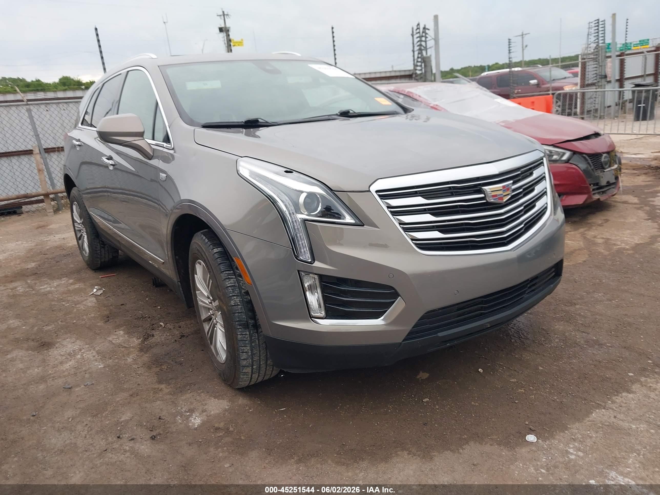 2017 Cadillac XT5 Luxury FWD, VIN 1GYKNBRS8HZ253143 — Hail