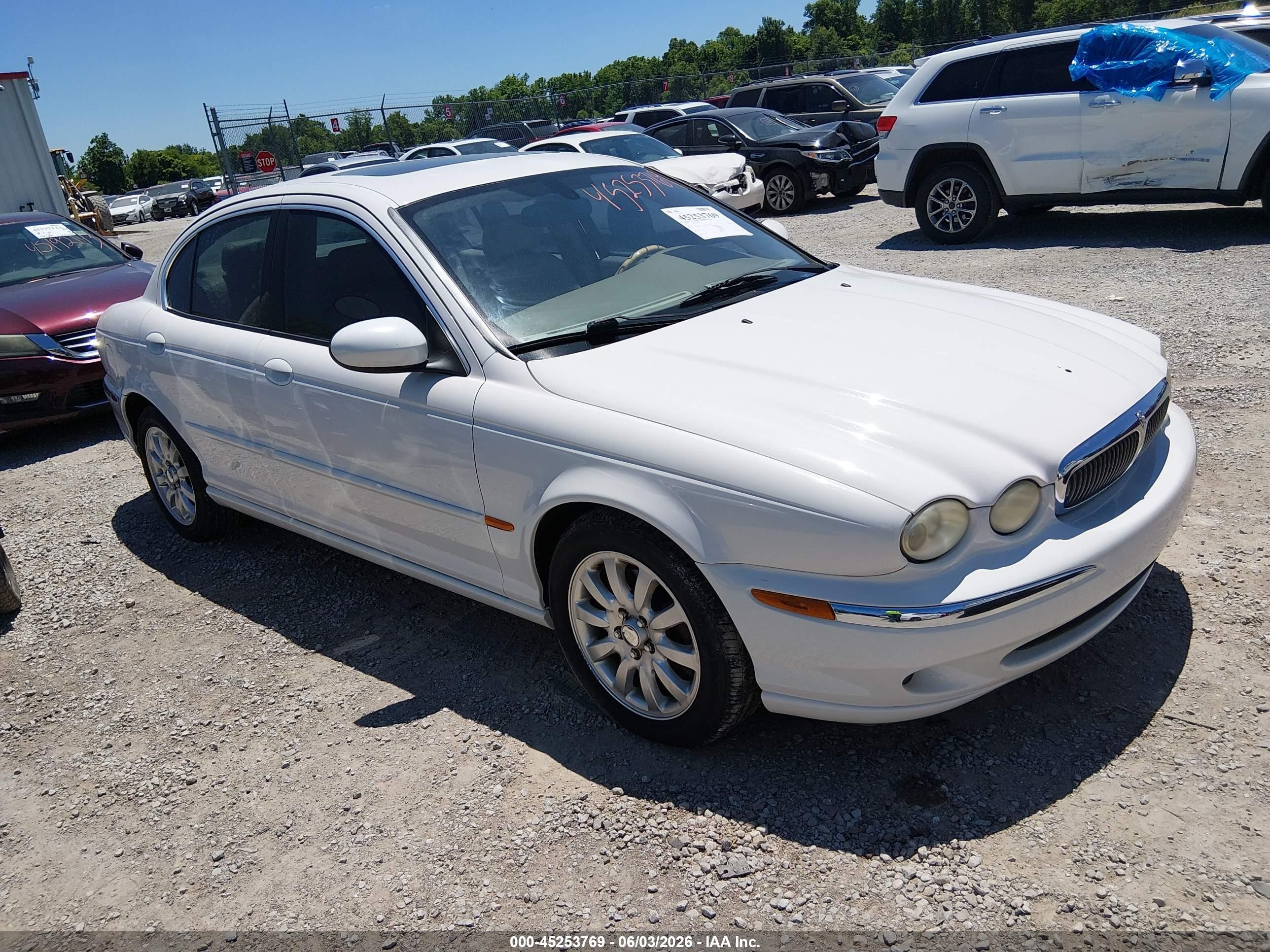 2003 Jaguar X-Type 2.5L Manual, VIN SAJEA51D23XC99007 — Бок