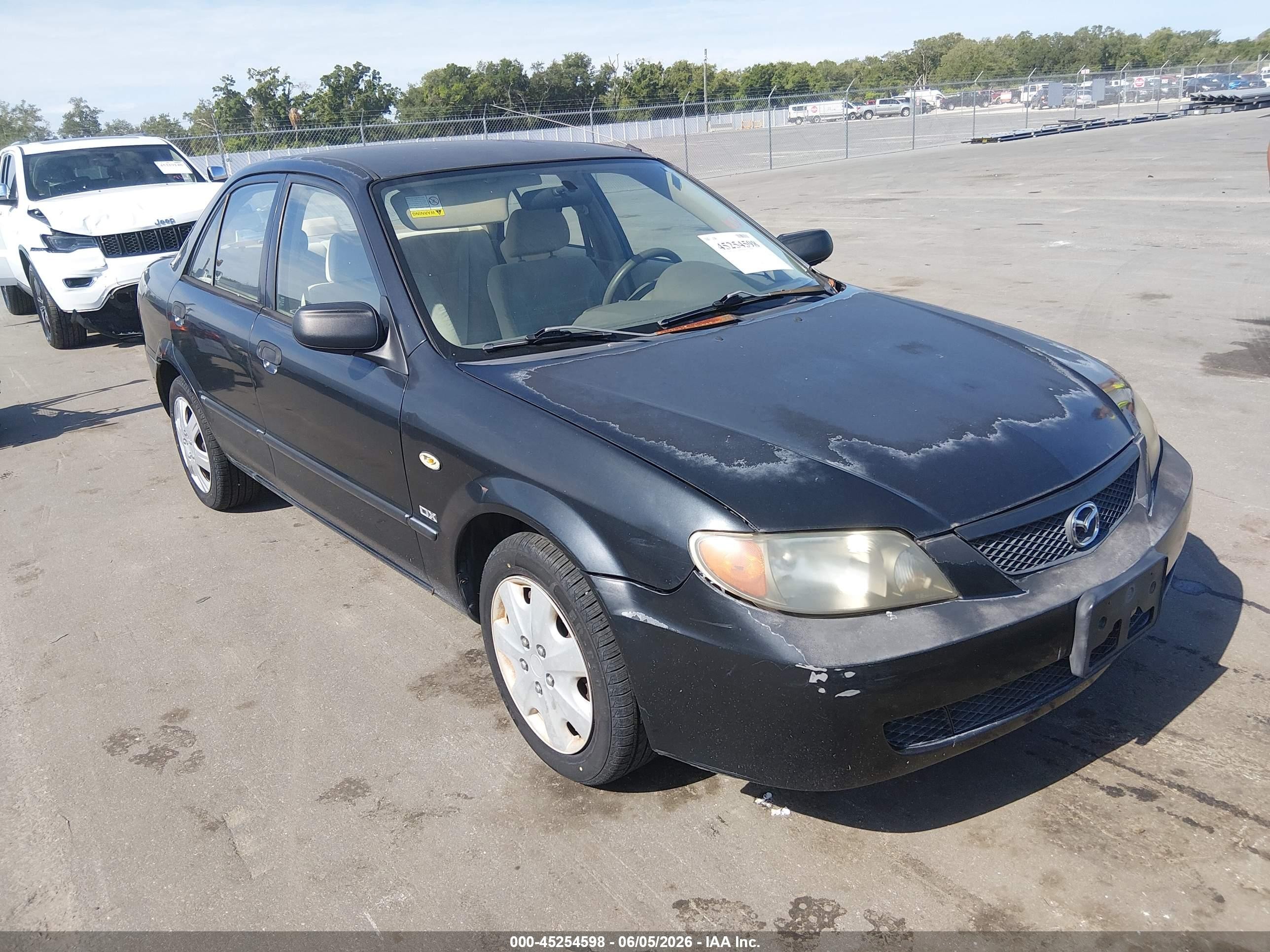 2002 Mazda Protege DX, VIN JM1BJ225321597569 — Normal wear
