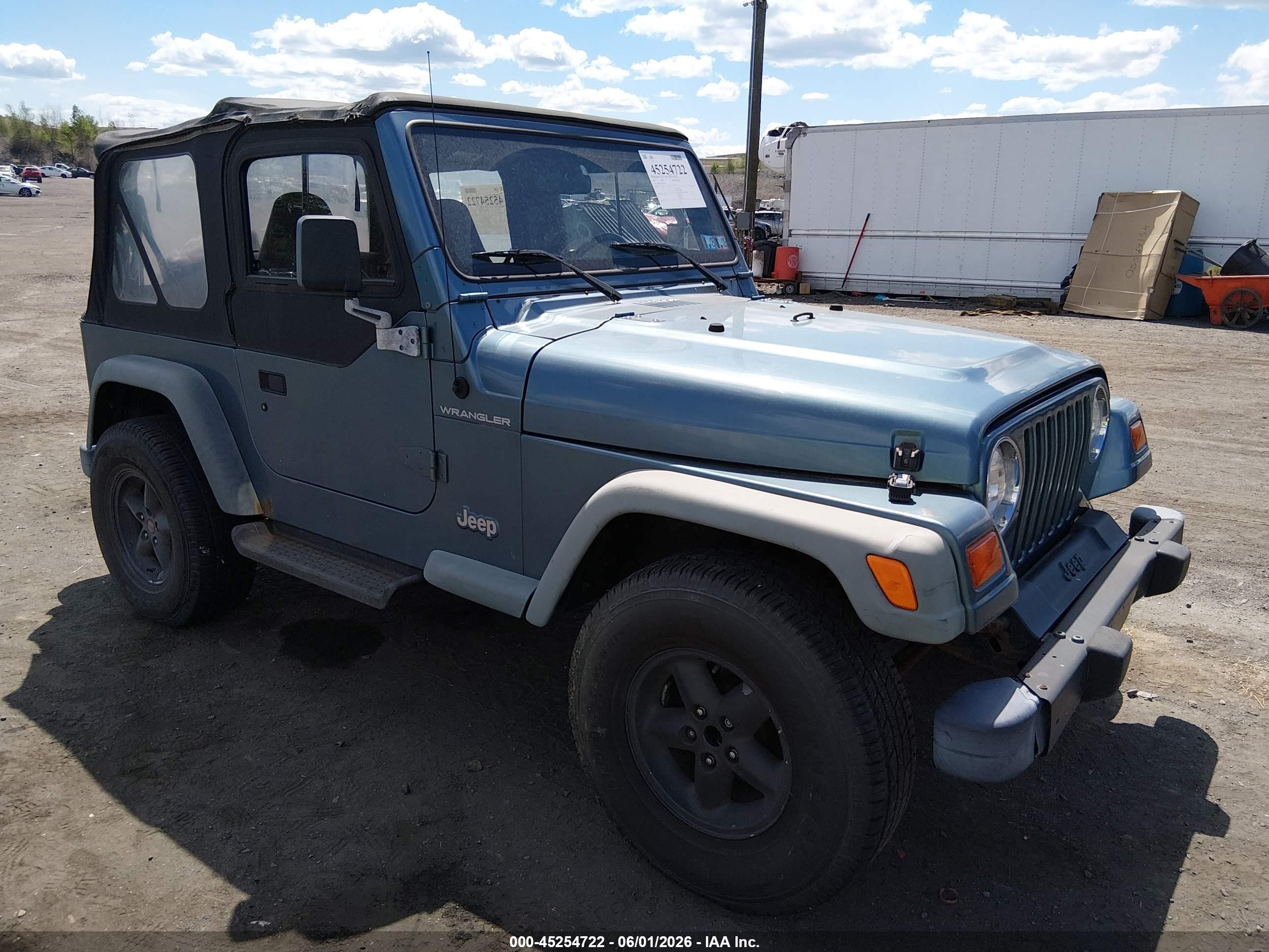 1999 Jeep Wrangler SE, VIN 1J4FY29P0XP476937 — Normal wear