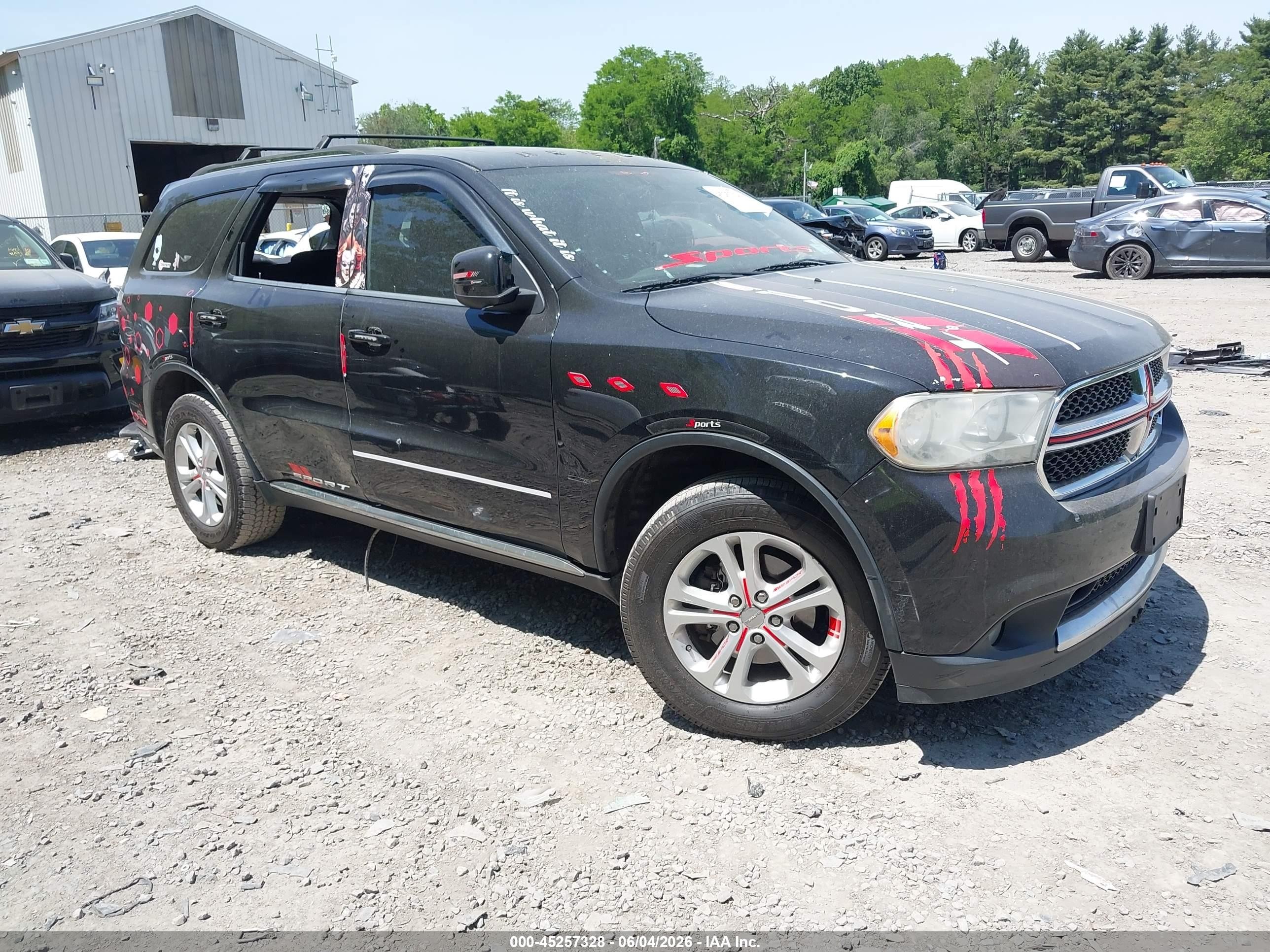 2013 Dodge Durango SXT, VIN 1C4RDJAG9DC669143 — Vandalism