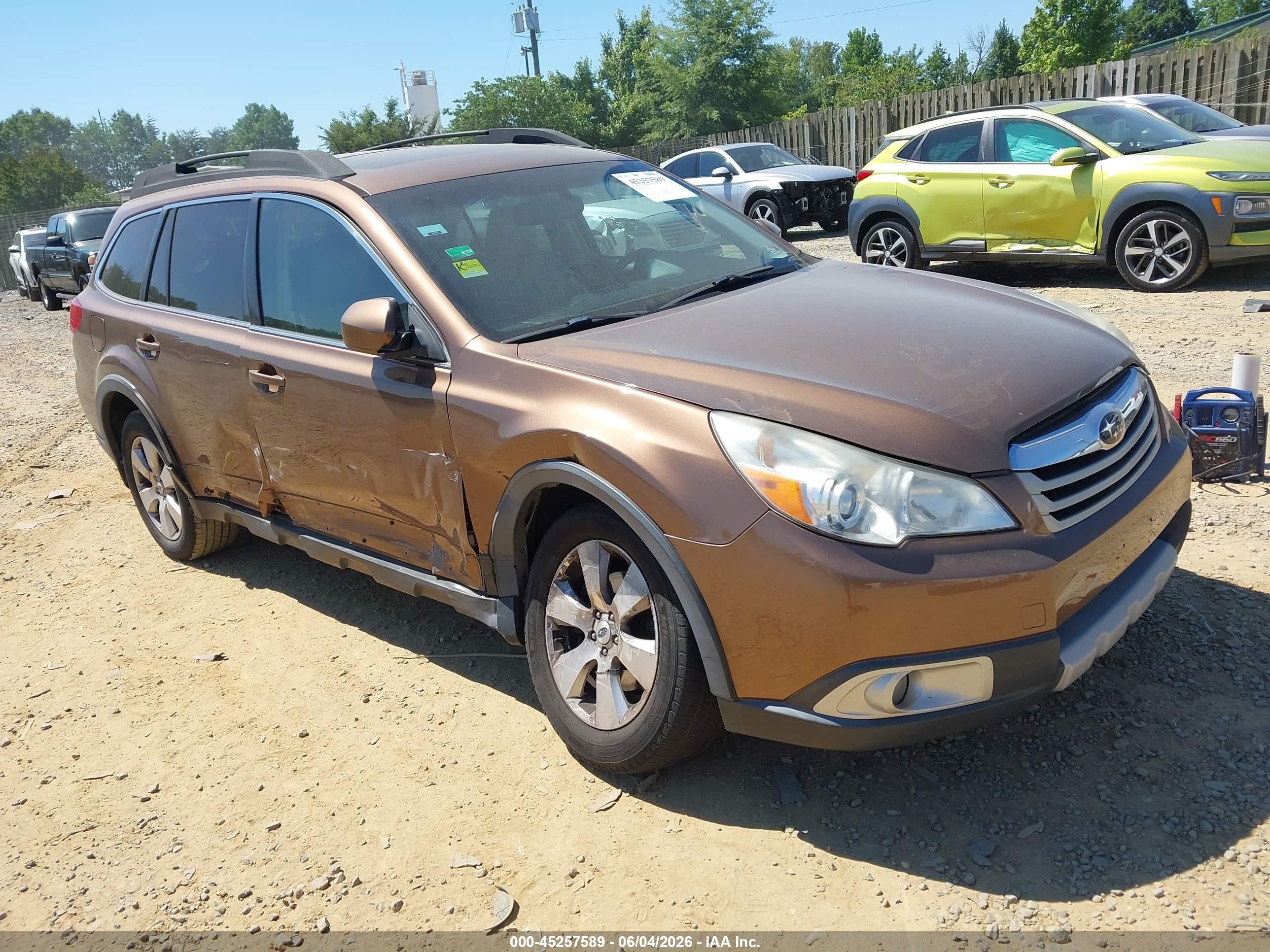 2012 Subaru Outback Limited, VIN 4S4BRDKCXC2290040 — Side