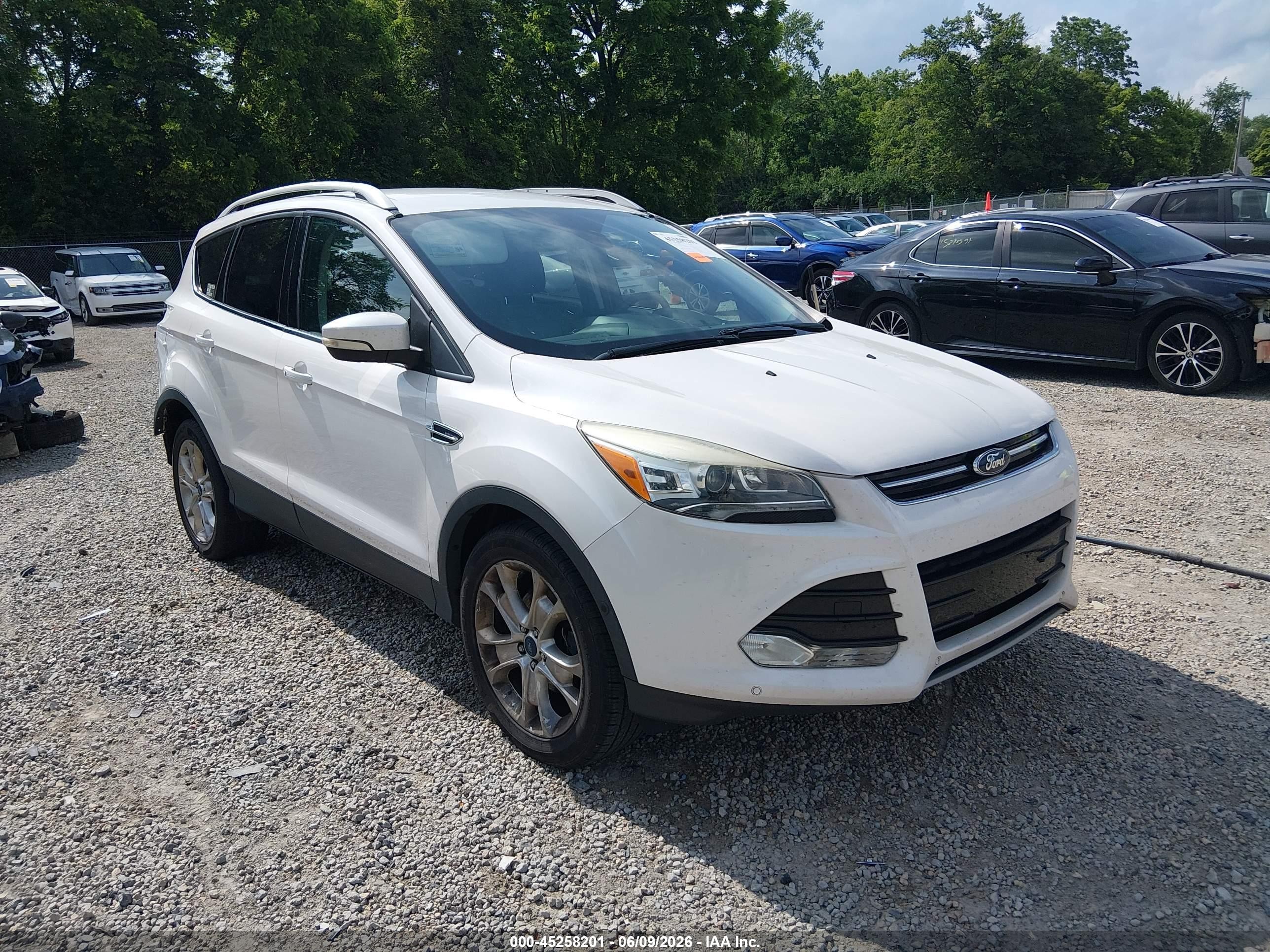 2015 Ford Escape Titanium, VIN 1FMCU0JX6FUB79851 — Rear end