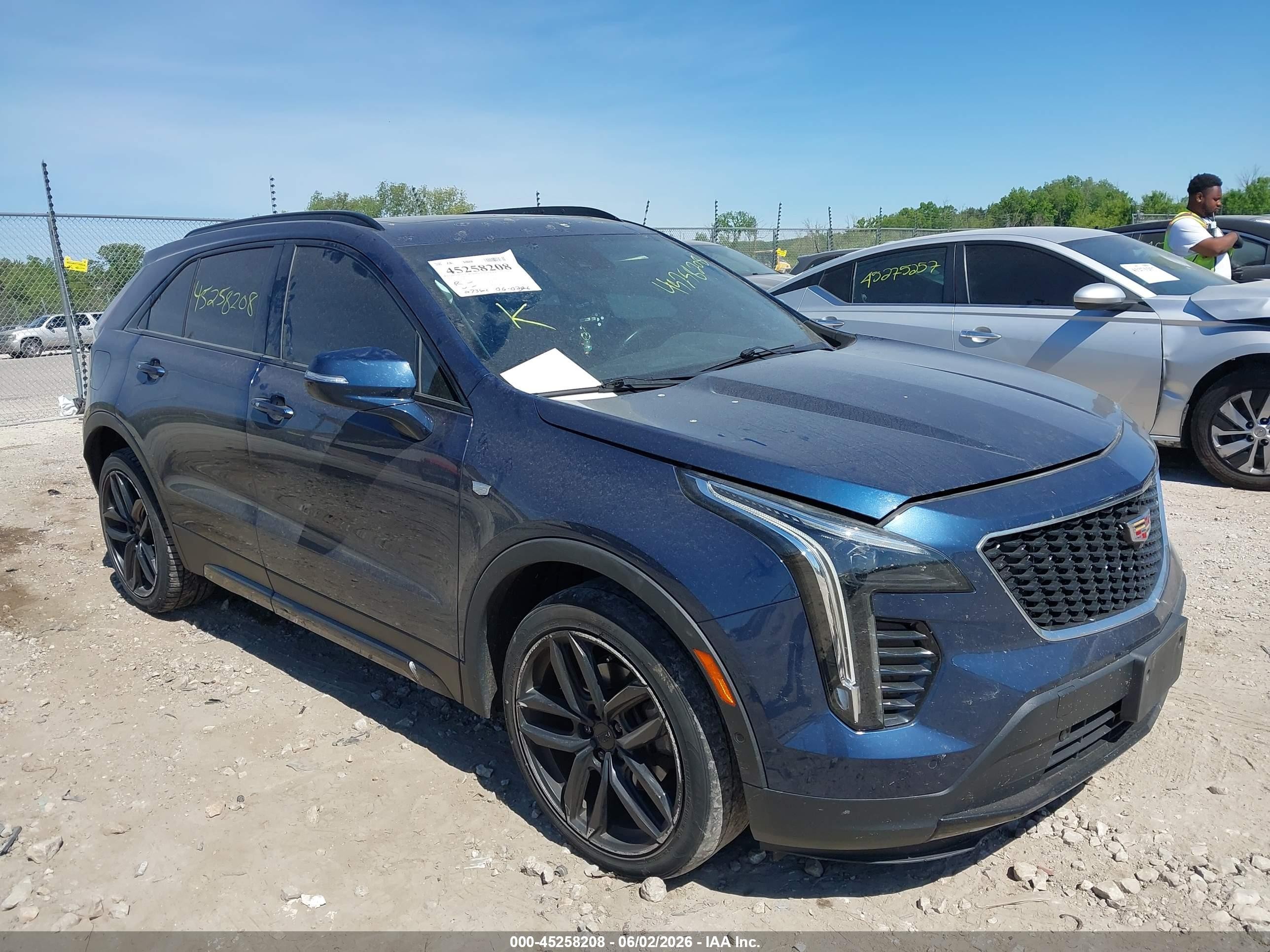 2019 Cadillac XT4 AWD Sport, VIN 1GYFZFR40KF197187 — Side