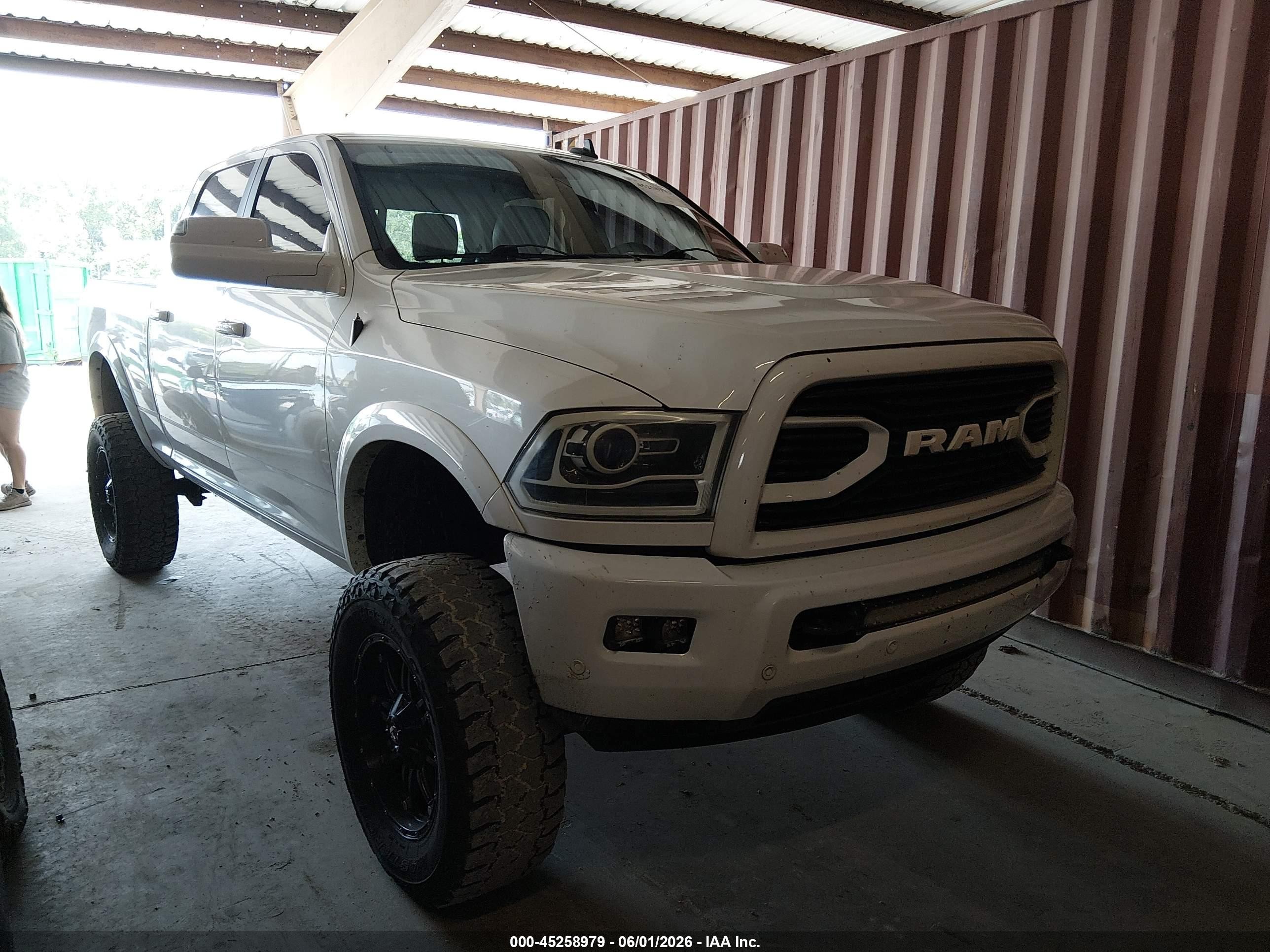 2016 Ram 2500 Longhorn Limited, VIN 3C6UR5GL5GG106803 — Storm