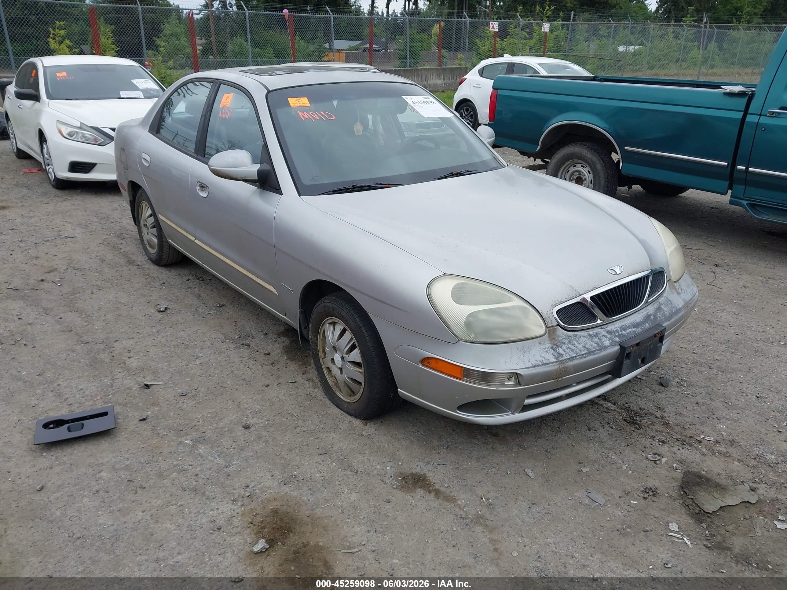 2001 Daewoo Nubira CDX, VIN KLAJB52Z41K650390 — Бок