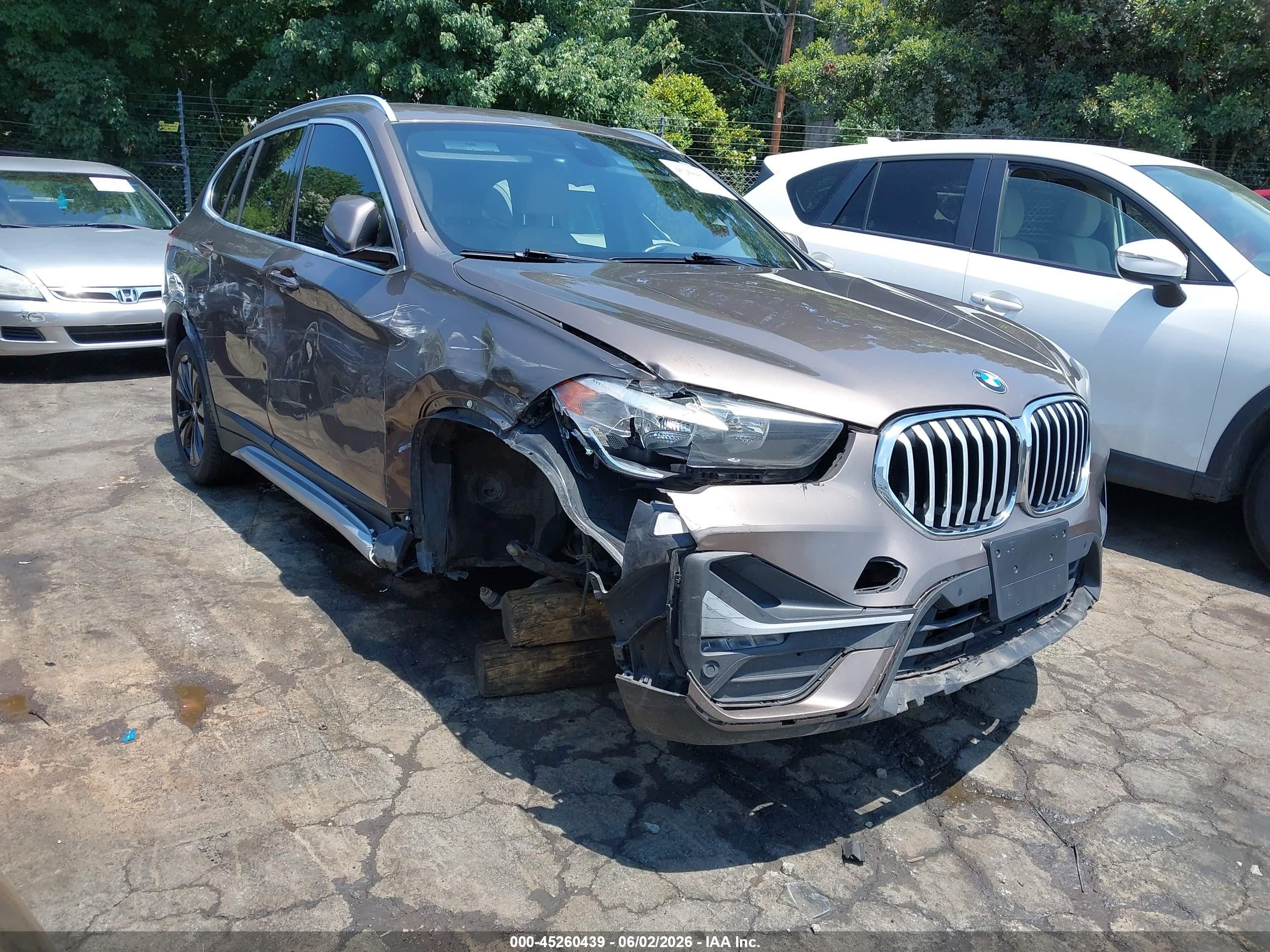 2020 BMW X1 xDrive28i, VIN WBXJG9C08L5R21330 — Side
