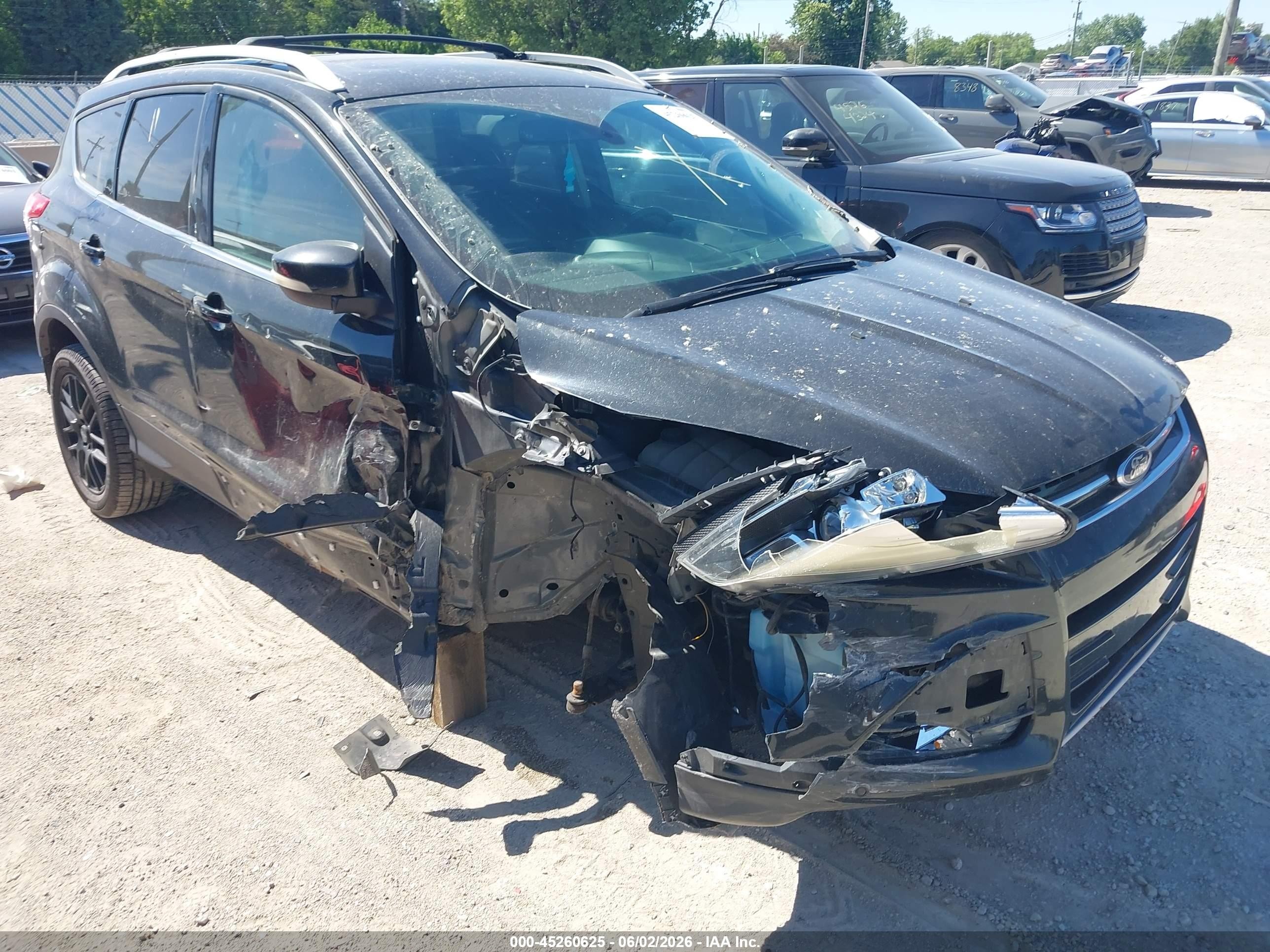 2015 Ford Escape Titanium, VIN 1FMCU9J96FUA48621 — Side