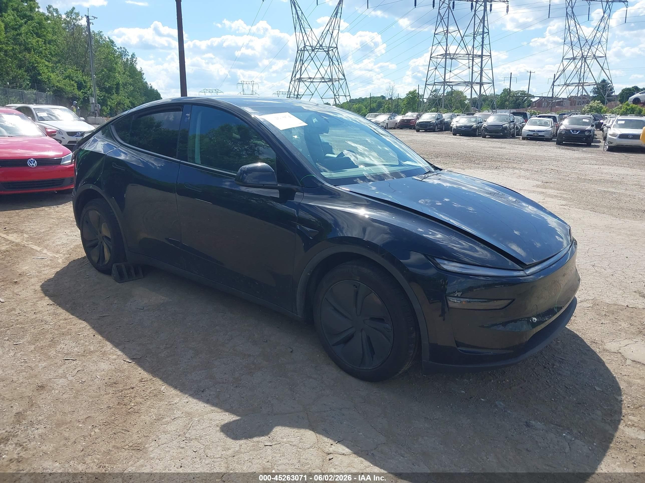 2026 Tesla Model Y Long Range, VIN 7SAYGDED3TF436934 — Front end