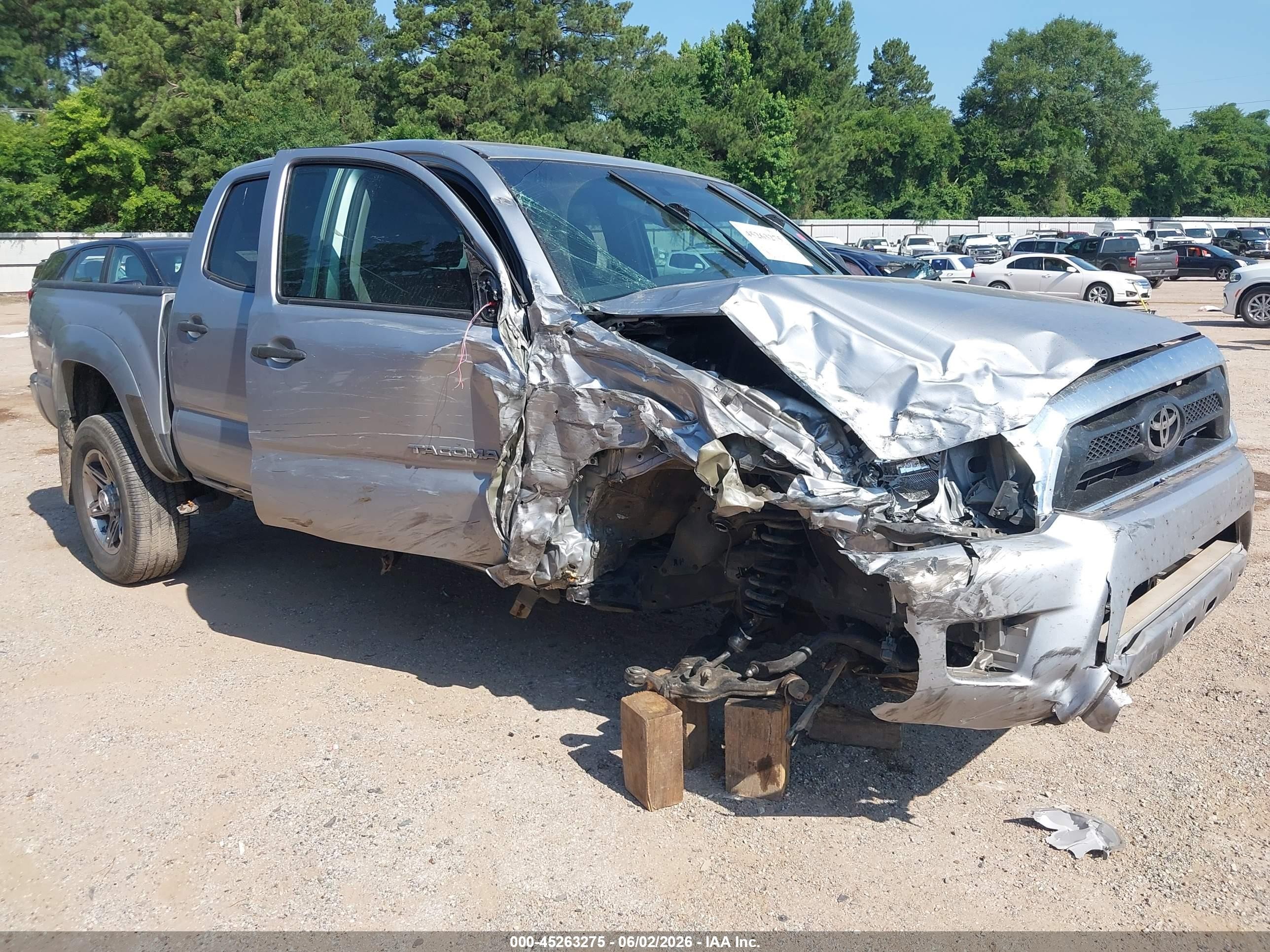 2014 Toyota Tacoma PreRunner, VIN 5TFJU4GN4EX059665 — Side