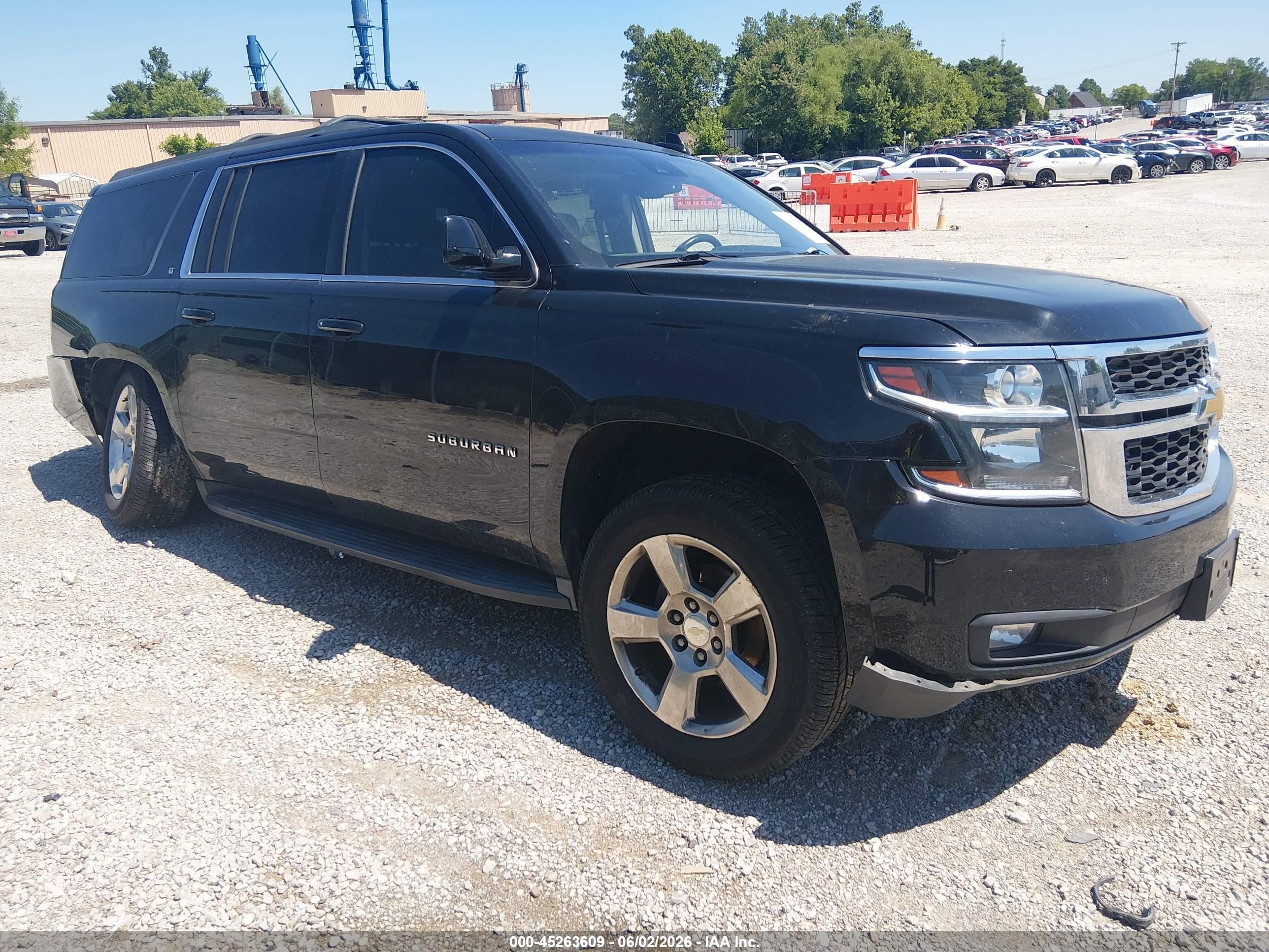 2016 Chevrolet Suburban LT, VIN 1GNSKHKCXGR266261 — Rear end