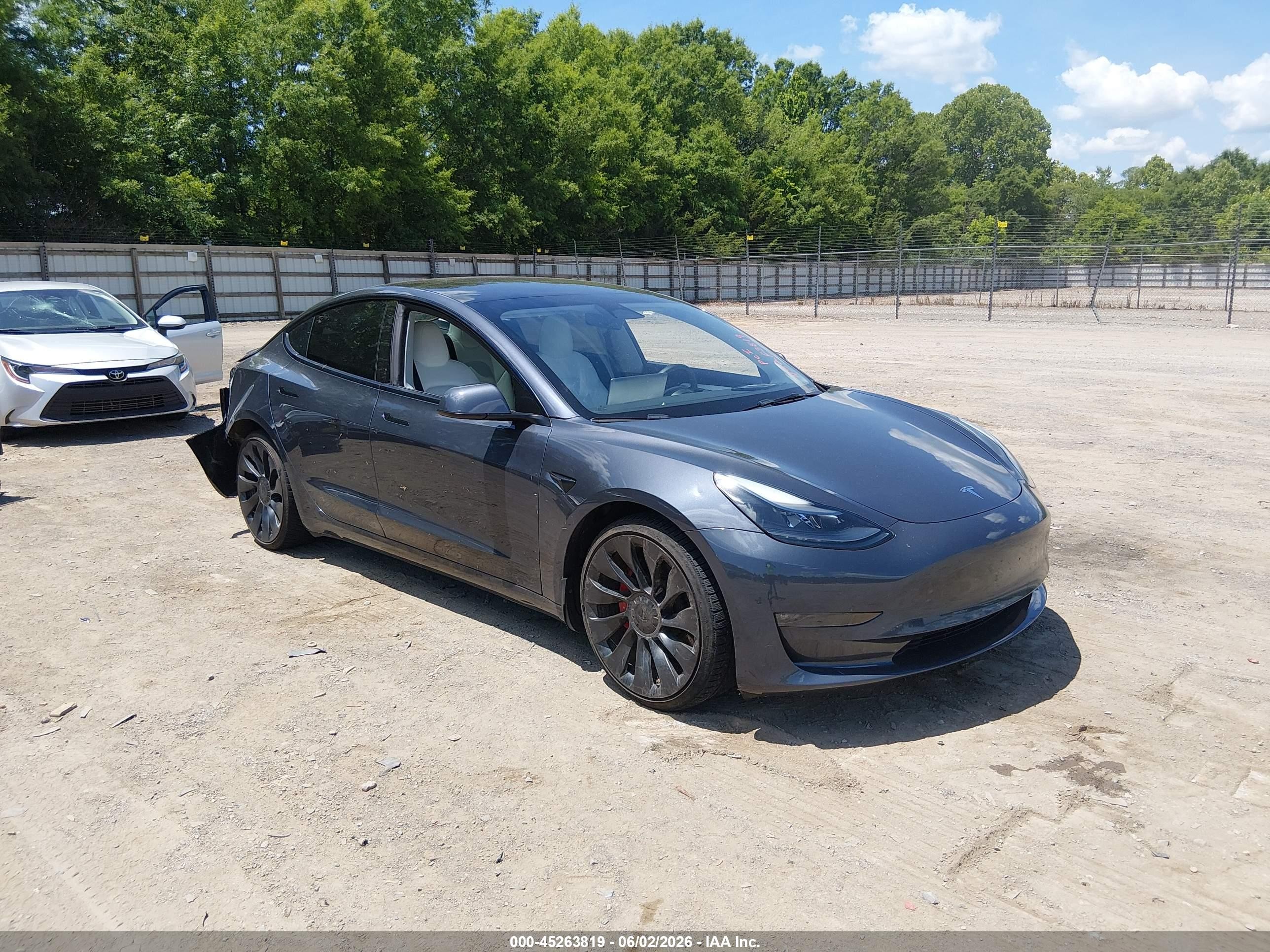 2023 Tesla Model 3 Performance, VIN 5YJ3E1EC7PF399251 — Rear end