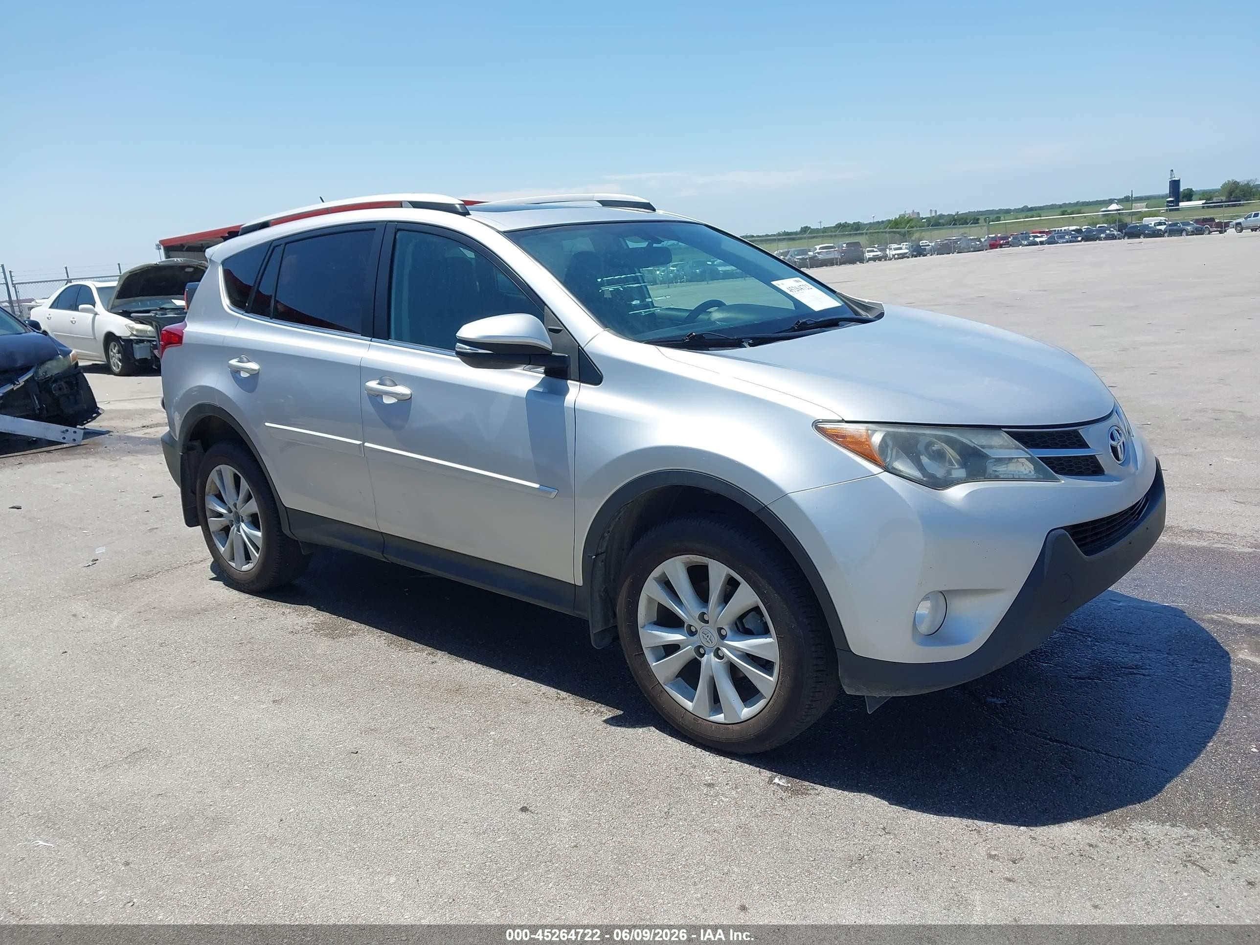 2013 Toyota RAV4 Limited, VIN 2T3DFREV6DW104180 — Side
