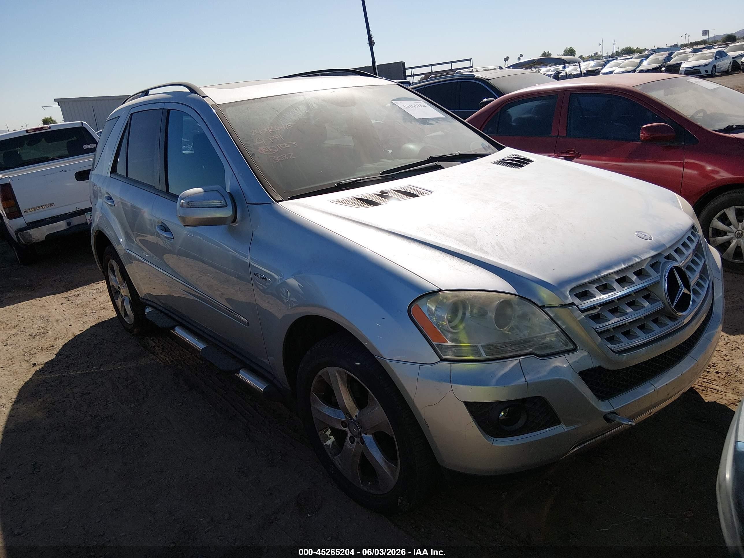 2009 Mercedes-Benz M 320, VIN 4JGBB25E59A493082 — Normal wear