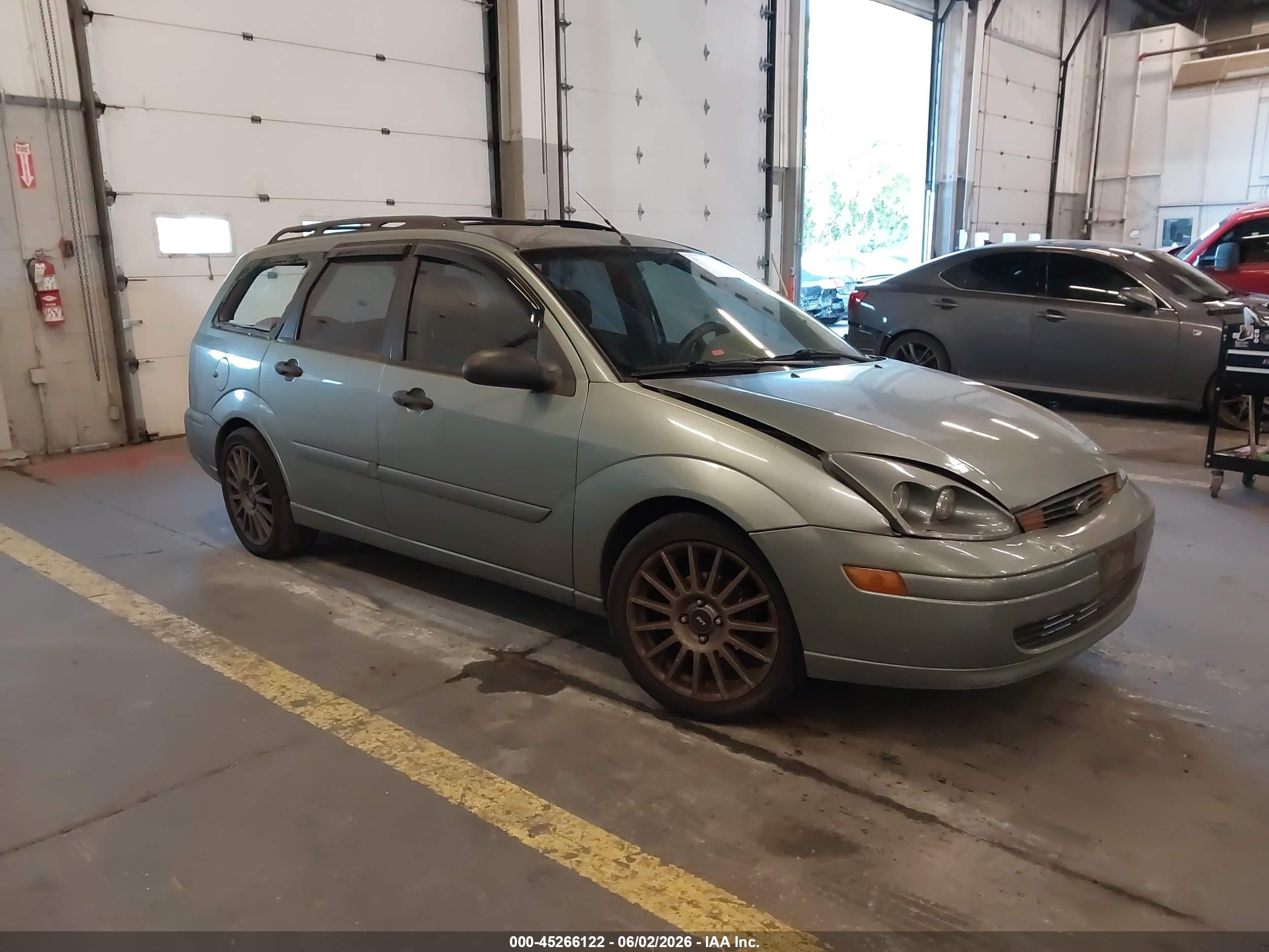 2003 Ford Focus SE Fleet, VIN 1FAHP36363W154608 — Side