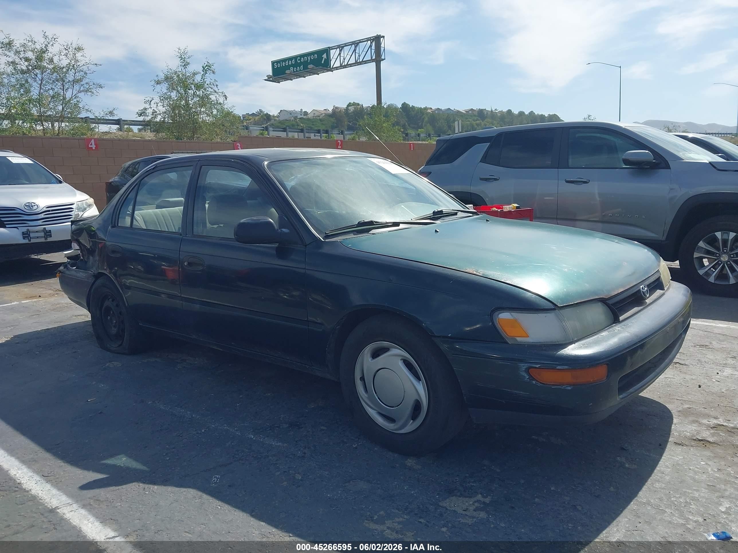 1997 Toyota Corolla, VIN 1NXBA02E8VZ623022 — Rear end