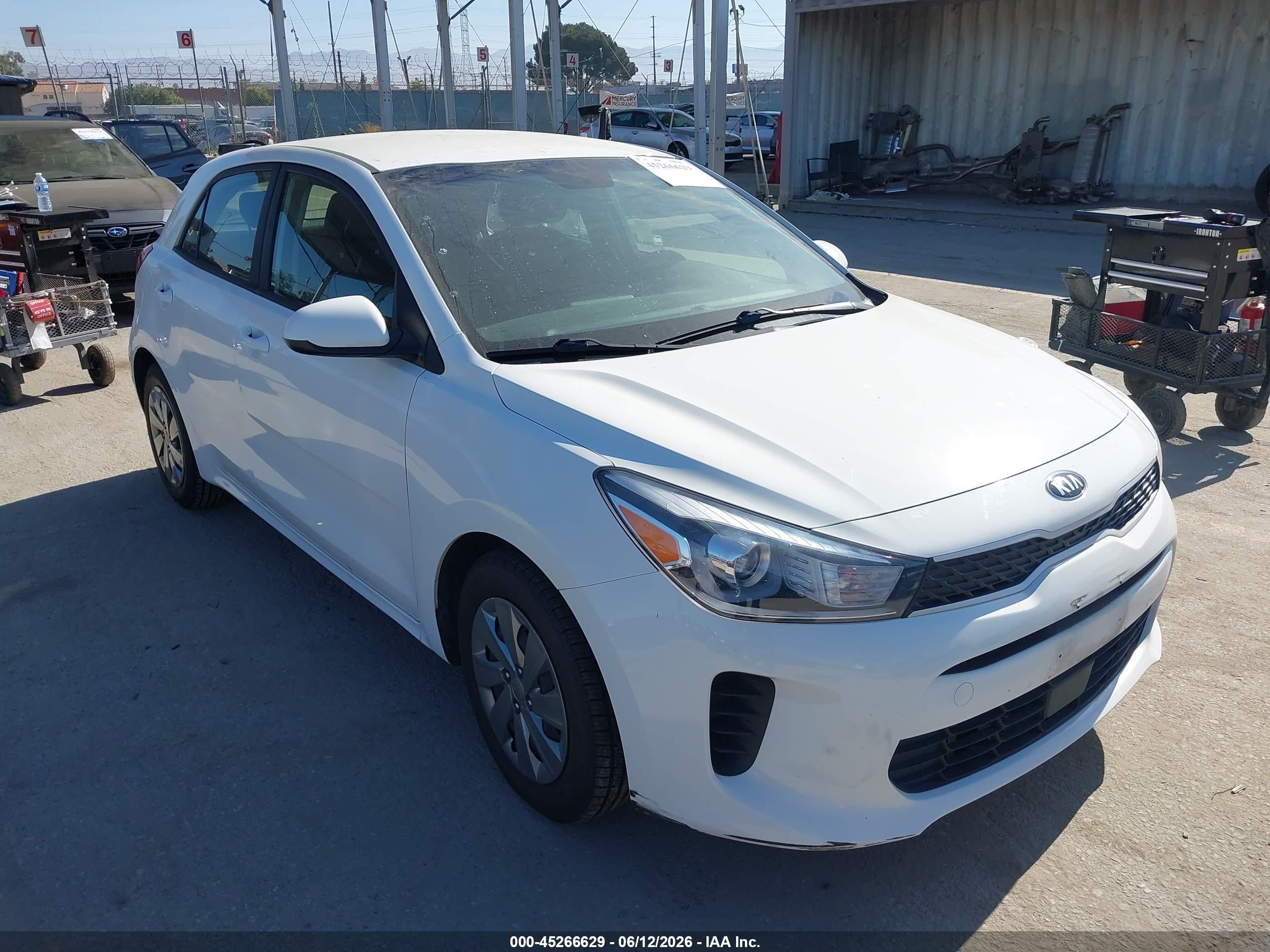 2020 Kia Rio S, VIN 3KPA25AD2LE333681 — Side