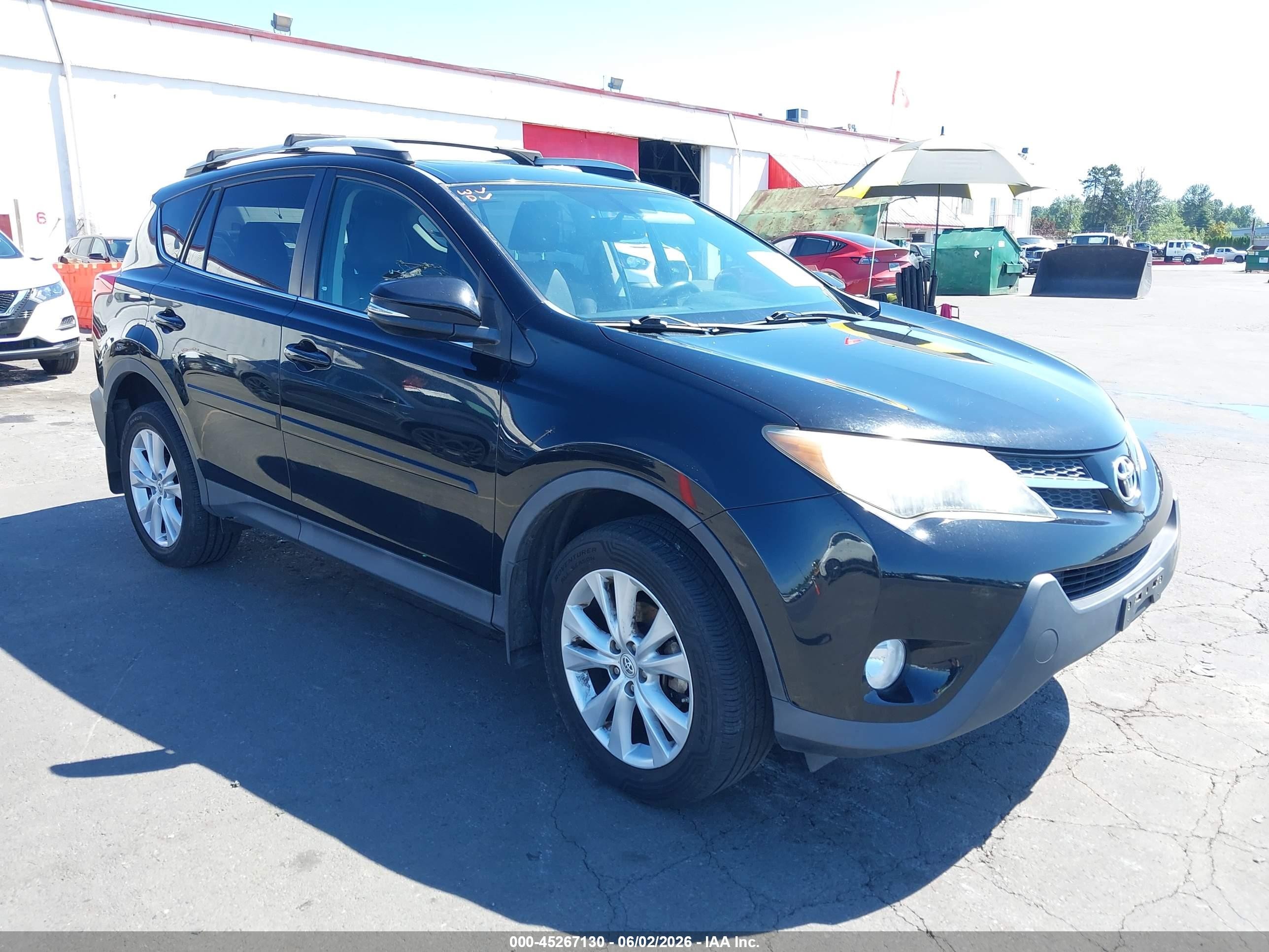 2015 Toyota RAV4 Limited, VIN 2T3DFREV0FW362522 — Side