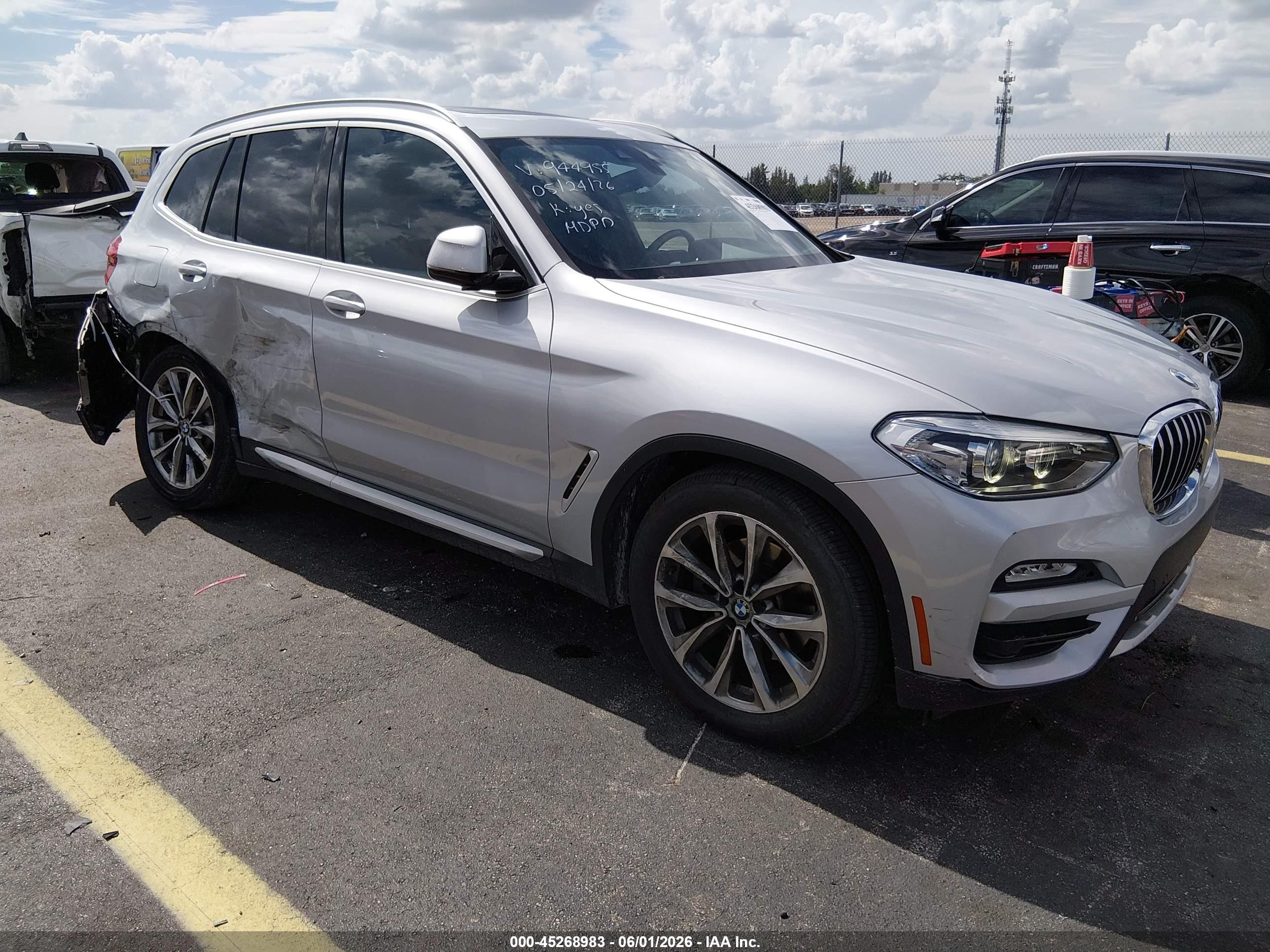 2019 BMW X3 sDrive30i, VIN 5UXTR7C5XKLE94955 — Side